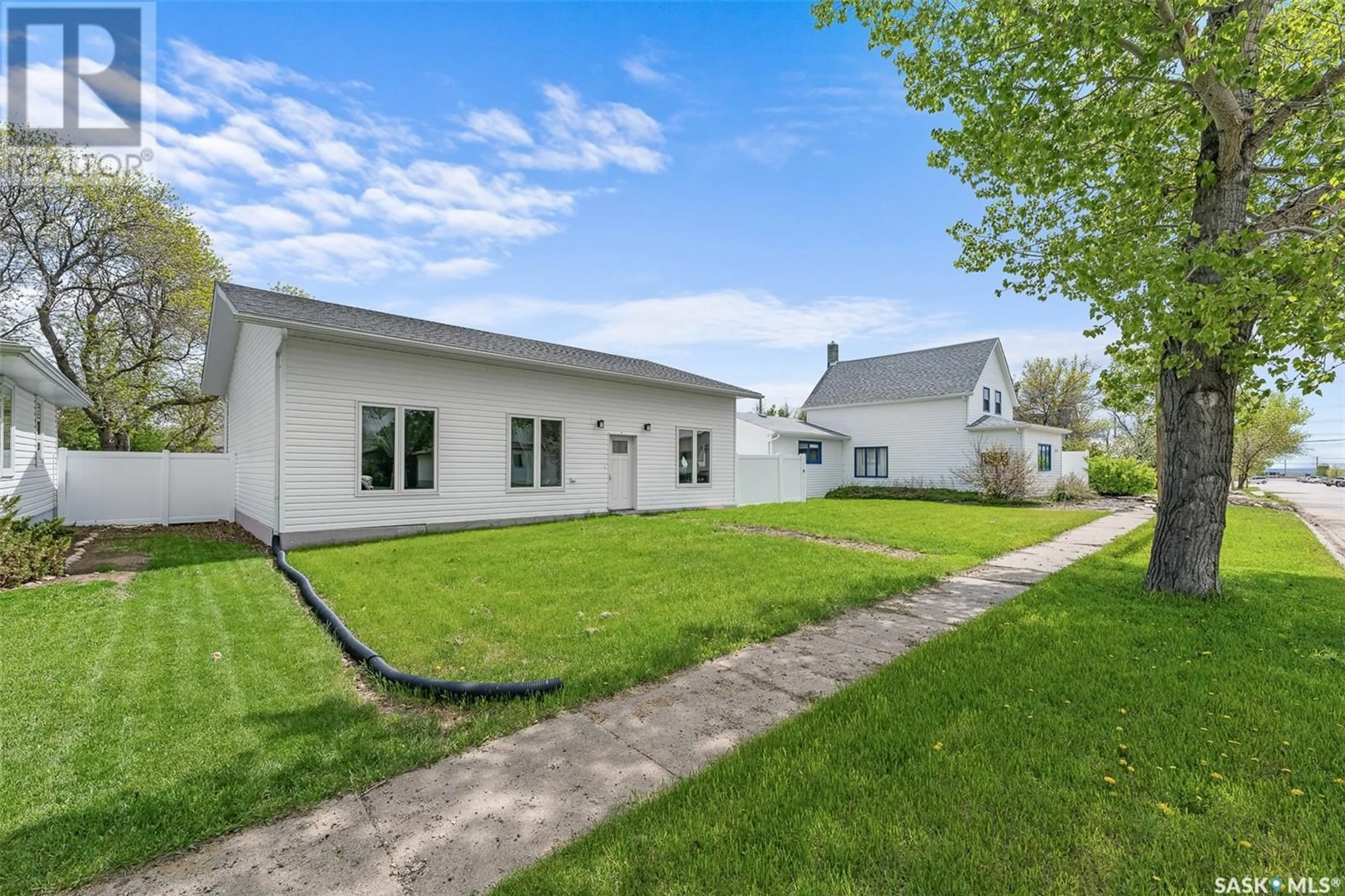 A pic from outside/outdoor area/front of a property/back of a property/a pic from drone, street for 214 Main STREET, Rouleau Saskatchewan S0G4H0