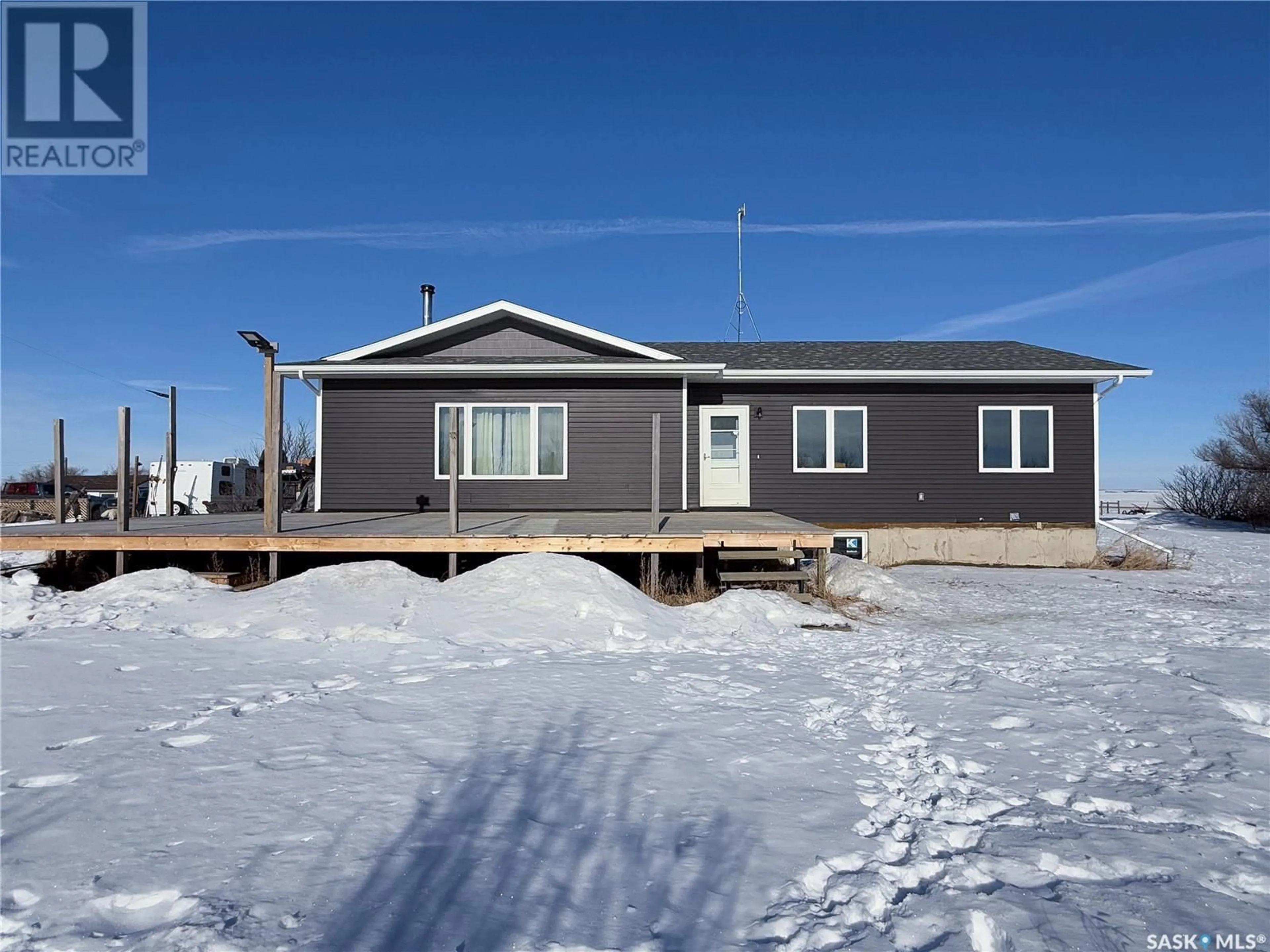 Home with vinyl exterior material, building for Hazlet Acreage, Pittville Rm No. 169 Saskatchewan S0N1E0