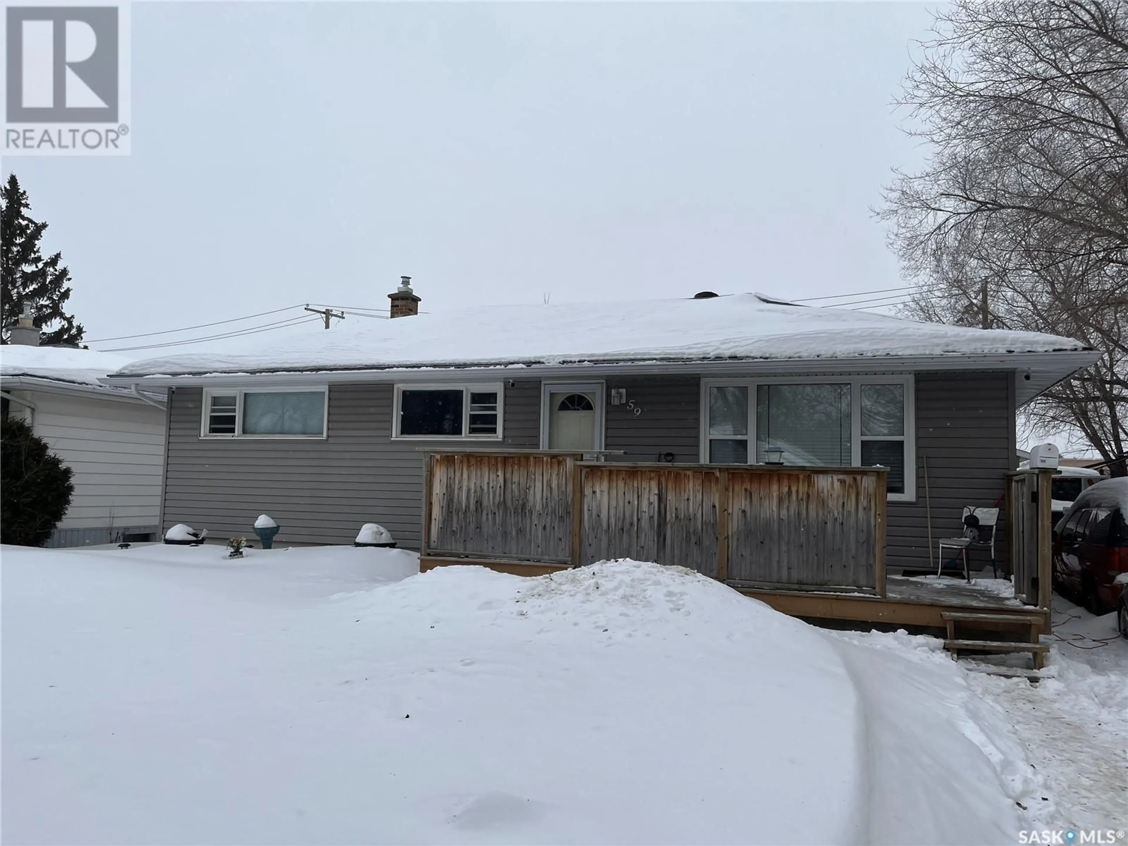 A pic from outside/outdoor area/front of a property/back of a property/a pic from drone, street for 59 Yarnton CRESCENT, Regina Saskatchewan S4R4A1