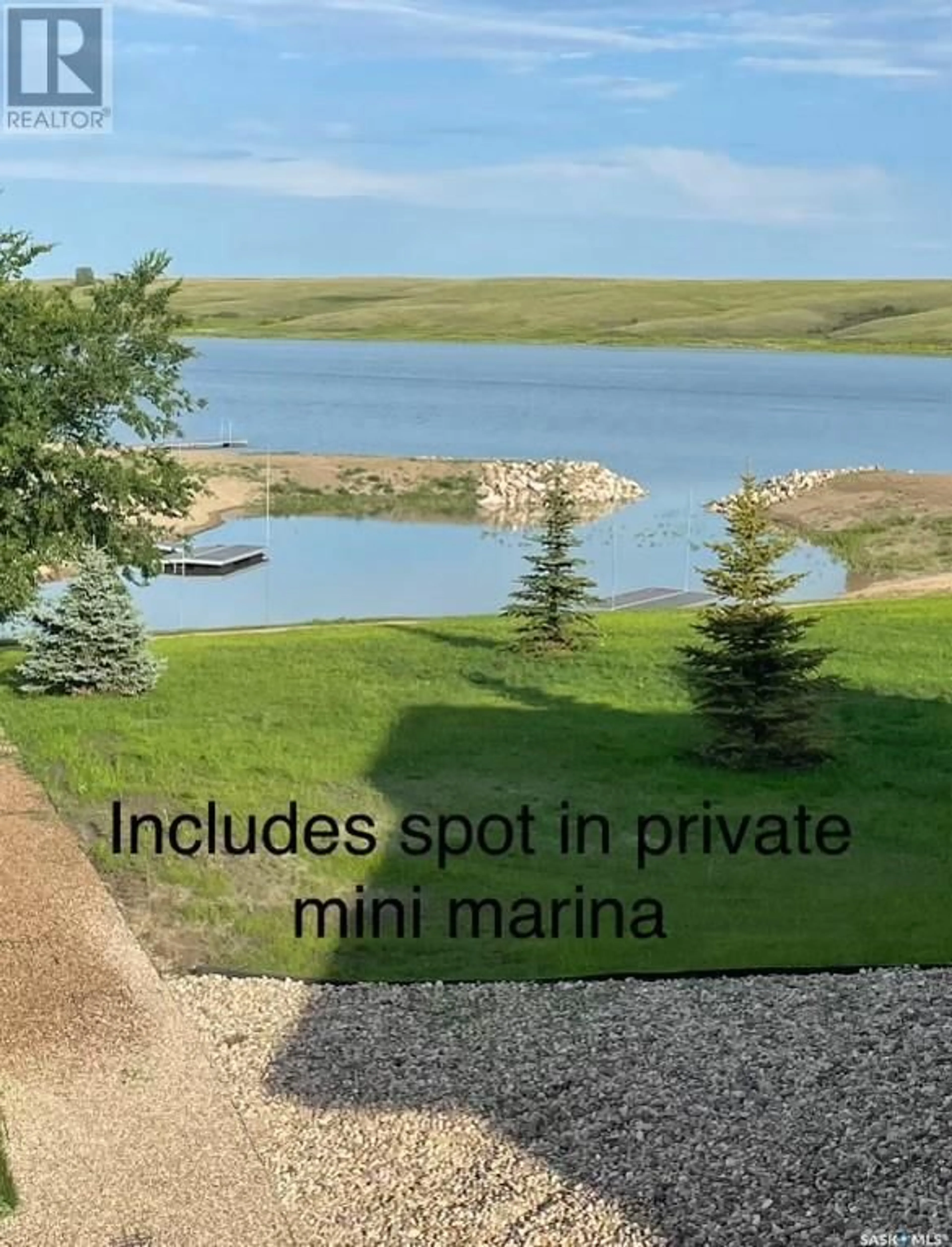 A pic from outside/outdoor area/front of a property/back of a property/a pic from drone, water/lake/river/ocean view for 11 Willow LANE, Diefenbaker Lake Saskatchewan S0L2E0