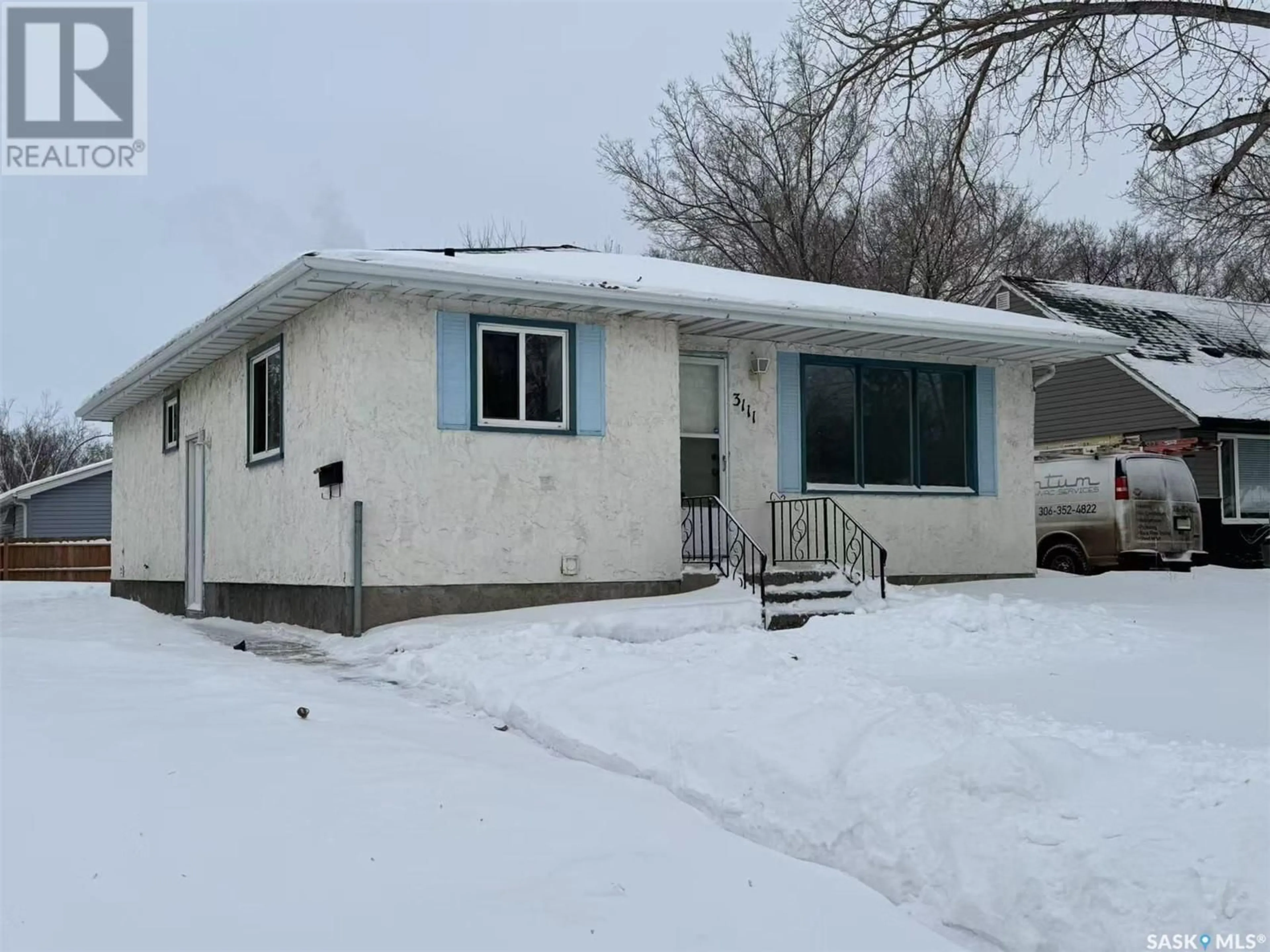 Home with vinyl exterior material, street for 3111 Dewdney AVENUE E, Regina Saskatchewan S4N5K3