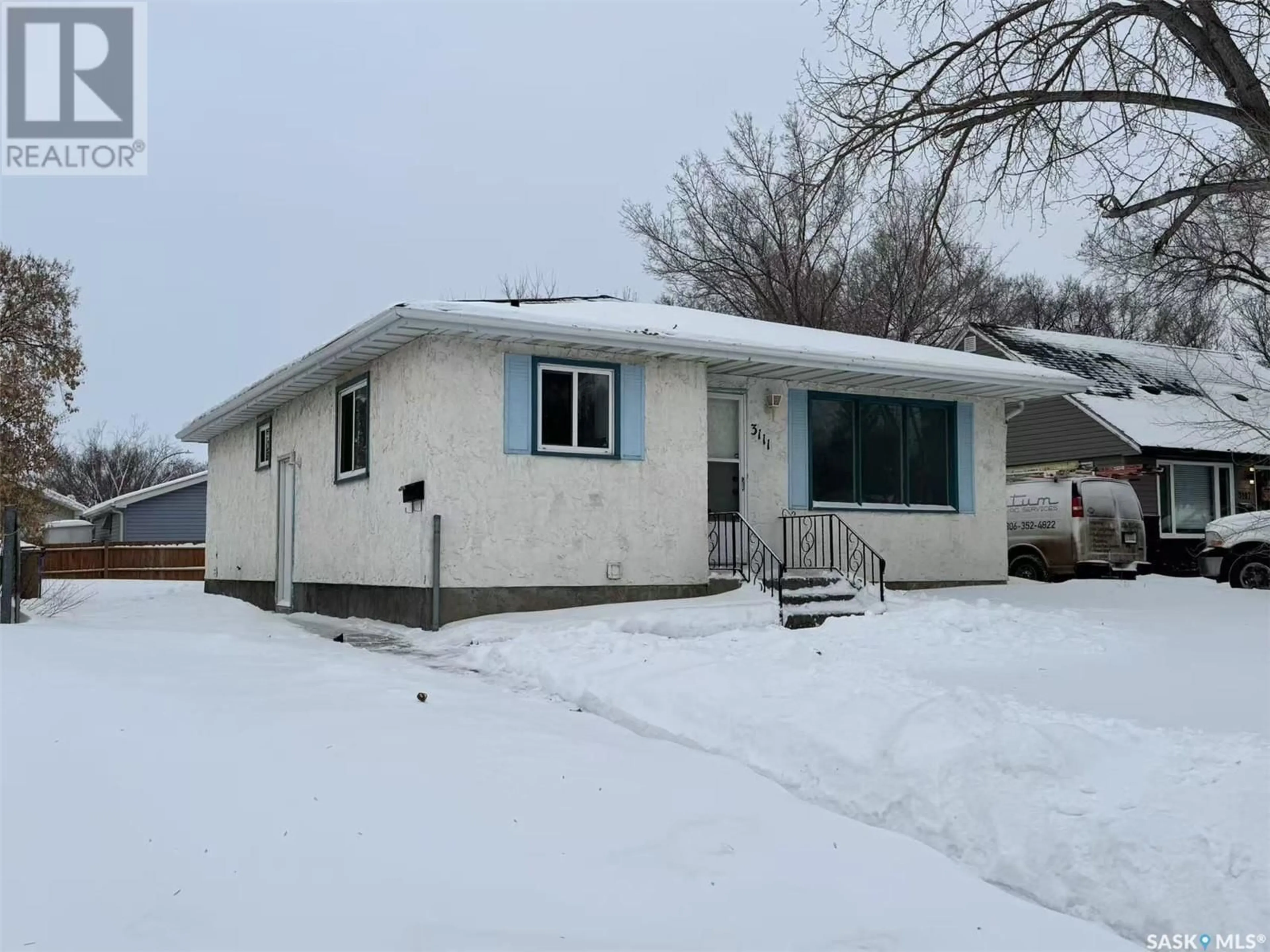 Home with vinyl exterior material, street for 3111 Dewdney AVENUE E, Regina Saskatchewan S4N5K3