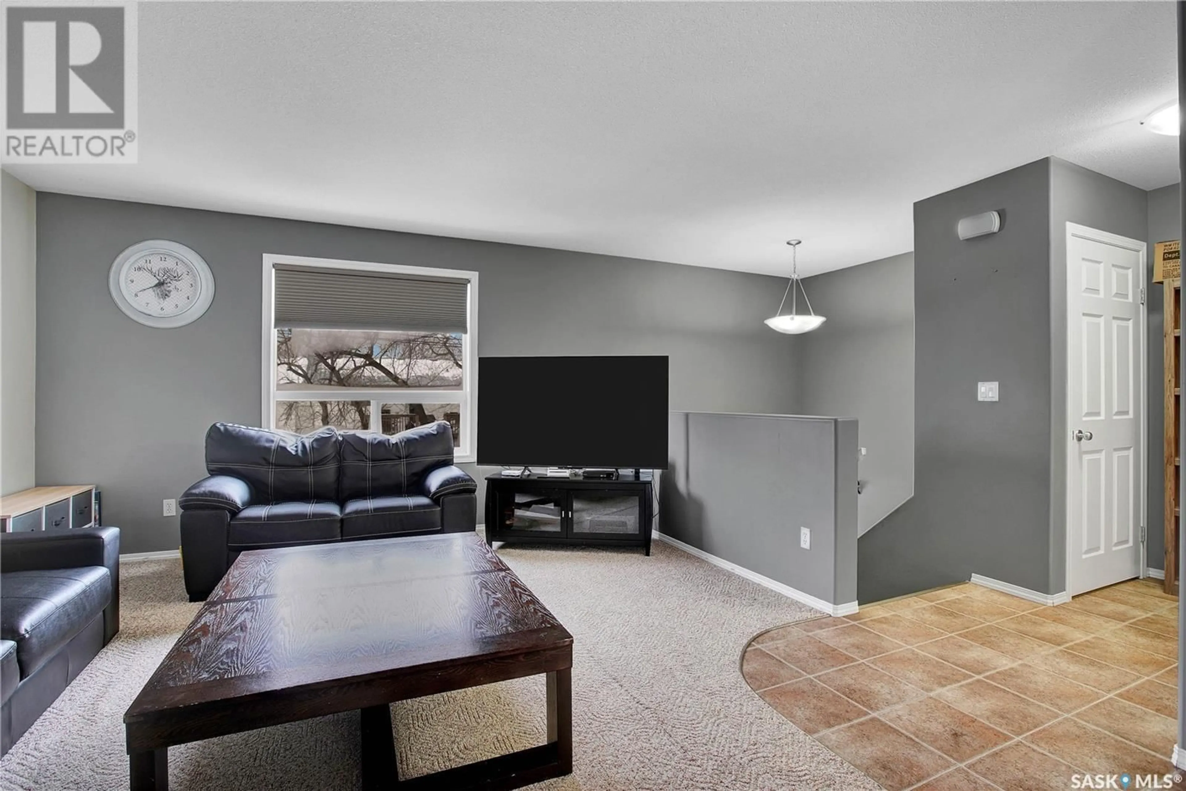 Living room with furniture, unknown for 10 132 Hiebert CRESCENT, Martensville Saskatchewan S0K2T2