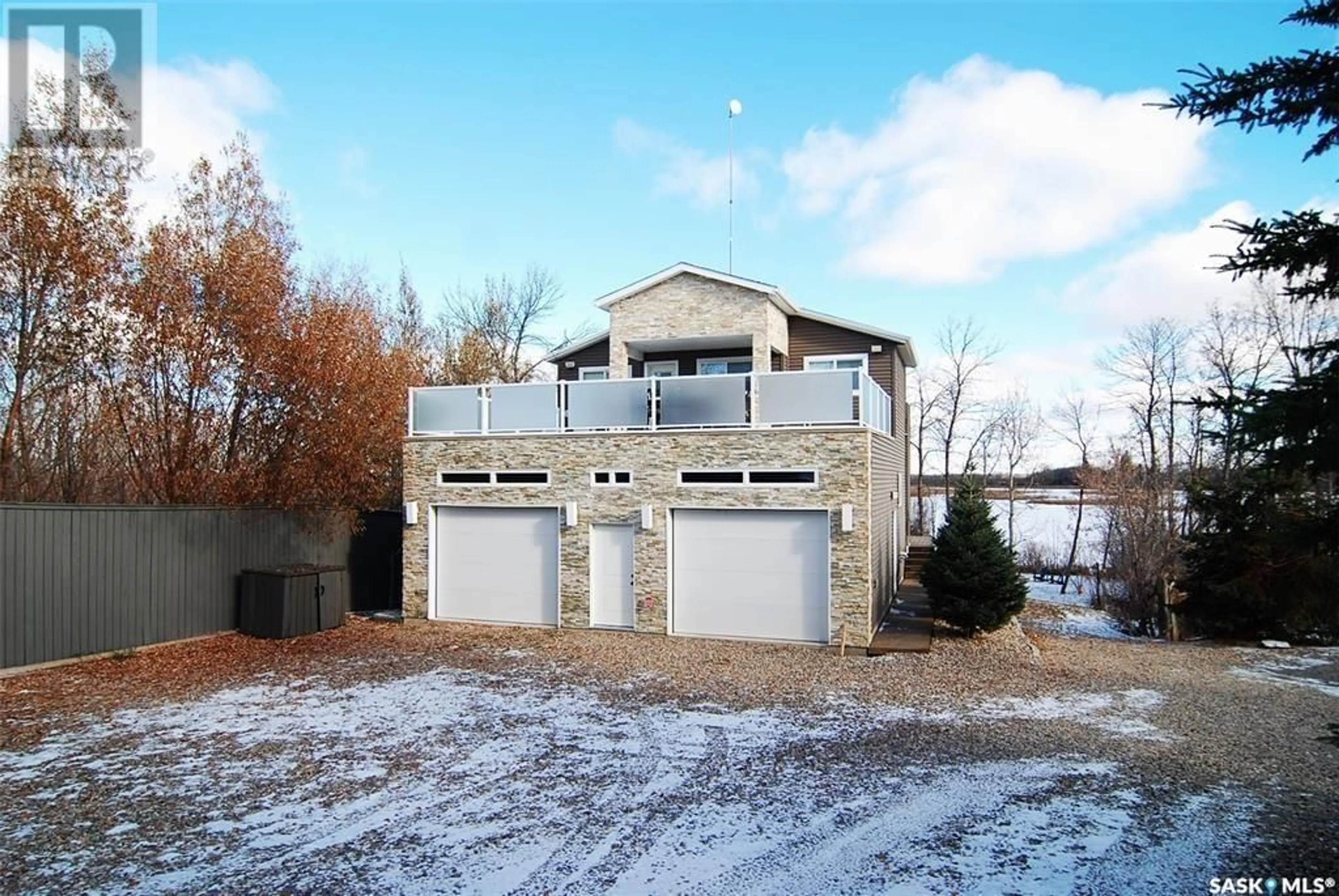 A pic from outside/outdoor area/front of a property/back of a property/a pic from drone, water/lake/river/ocean view for 19 Rose CRESCENT, Pike Lake Saskatchewan S7K1N2