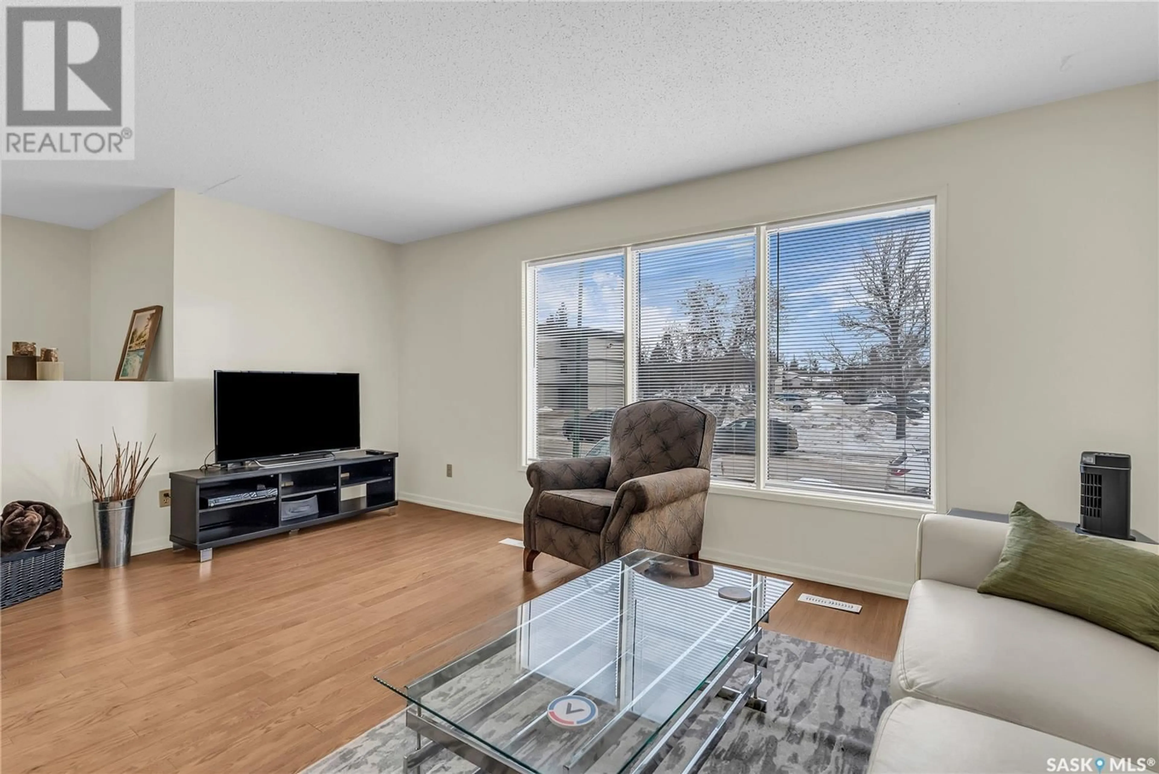 Living room with furniture, unknown for 375 & 377 Girgulis CRESCENT, Saskatoon Saskatchewan S7K6W8