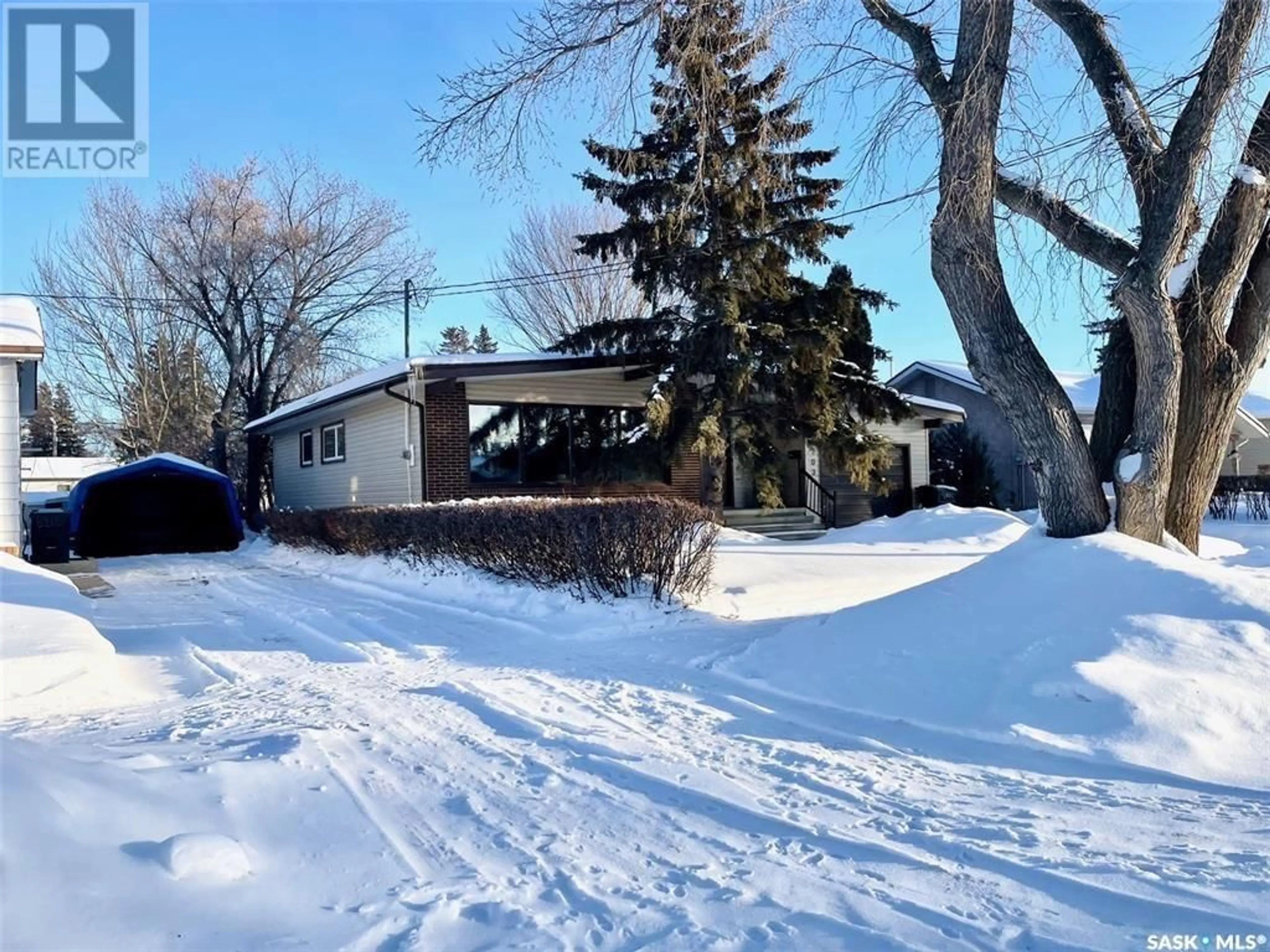 A pic from outside/outdoor area/front of a property/back of a property/a pic from drone, street for 103 Ontario AVENUE, Yorkton Saskatchewan S3N1Z8