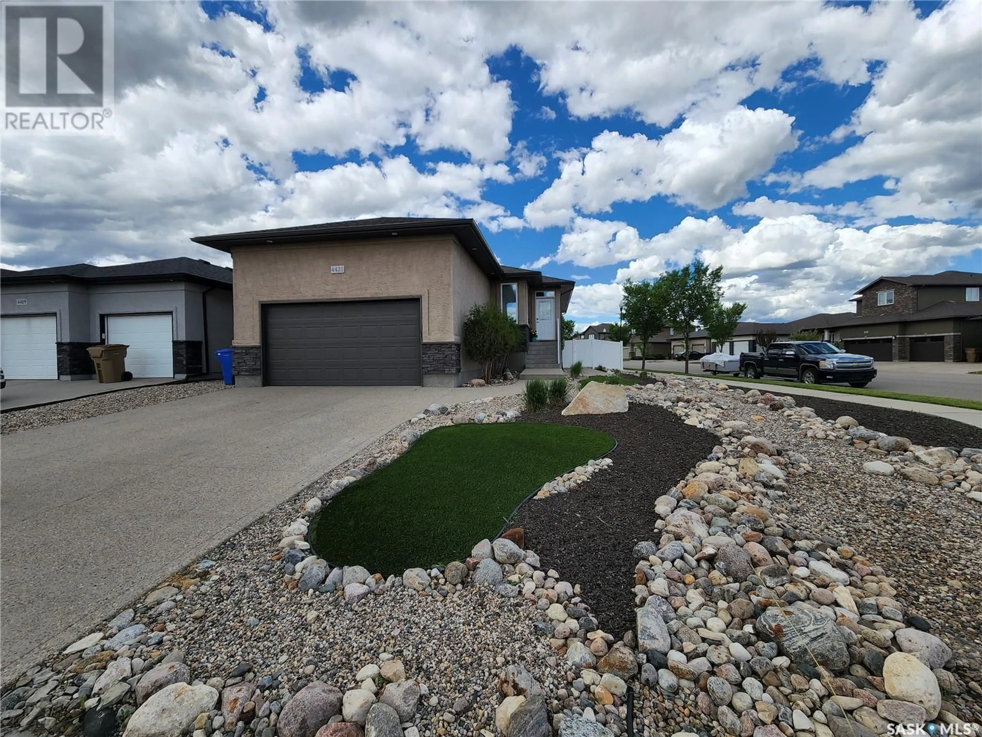 A pic from outside/outdoor area/front of a property/back of a property/a pic from drone, water/lake/river/ocean view for 4421 Sandpiper CRESCENT E, Regina Saskatchewan S4V1N3