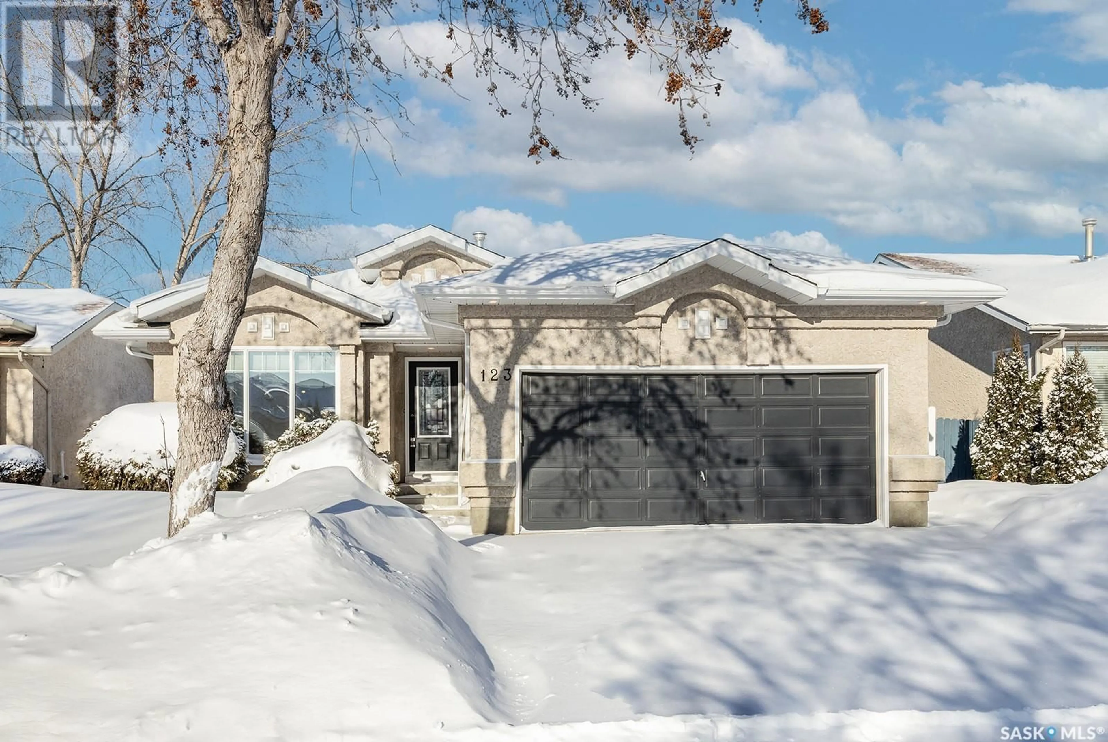 Home with vinyl exterior material, street for 123 Steiger CRESCENT, Saskatoon Saskatchewan S7N4K1