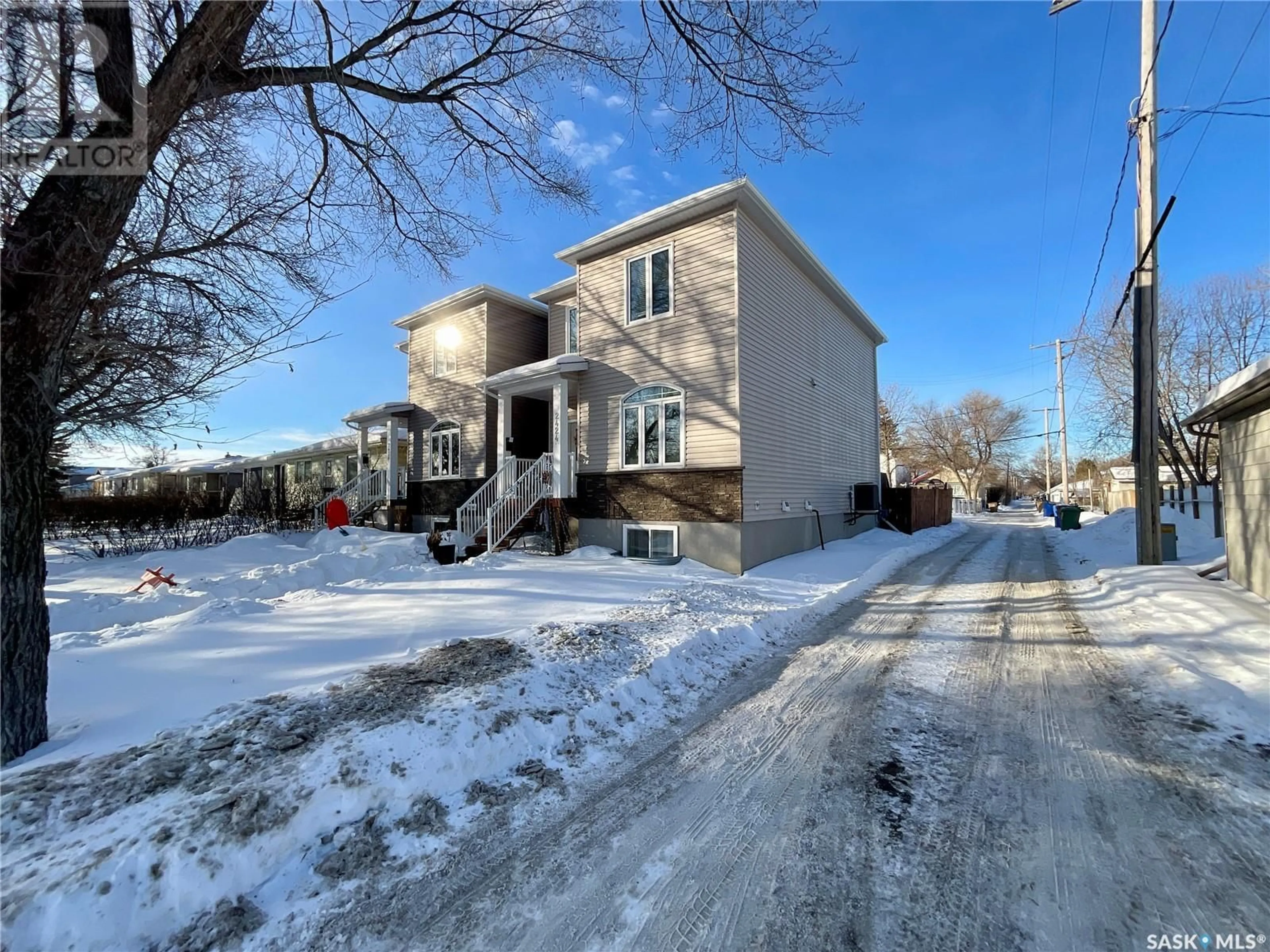 A pic from outside/outdoor area/front of a property/back of a property/a pic from drone, street for 2424 McAra STREET, Regina Saskatchewan S4N2W5