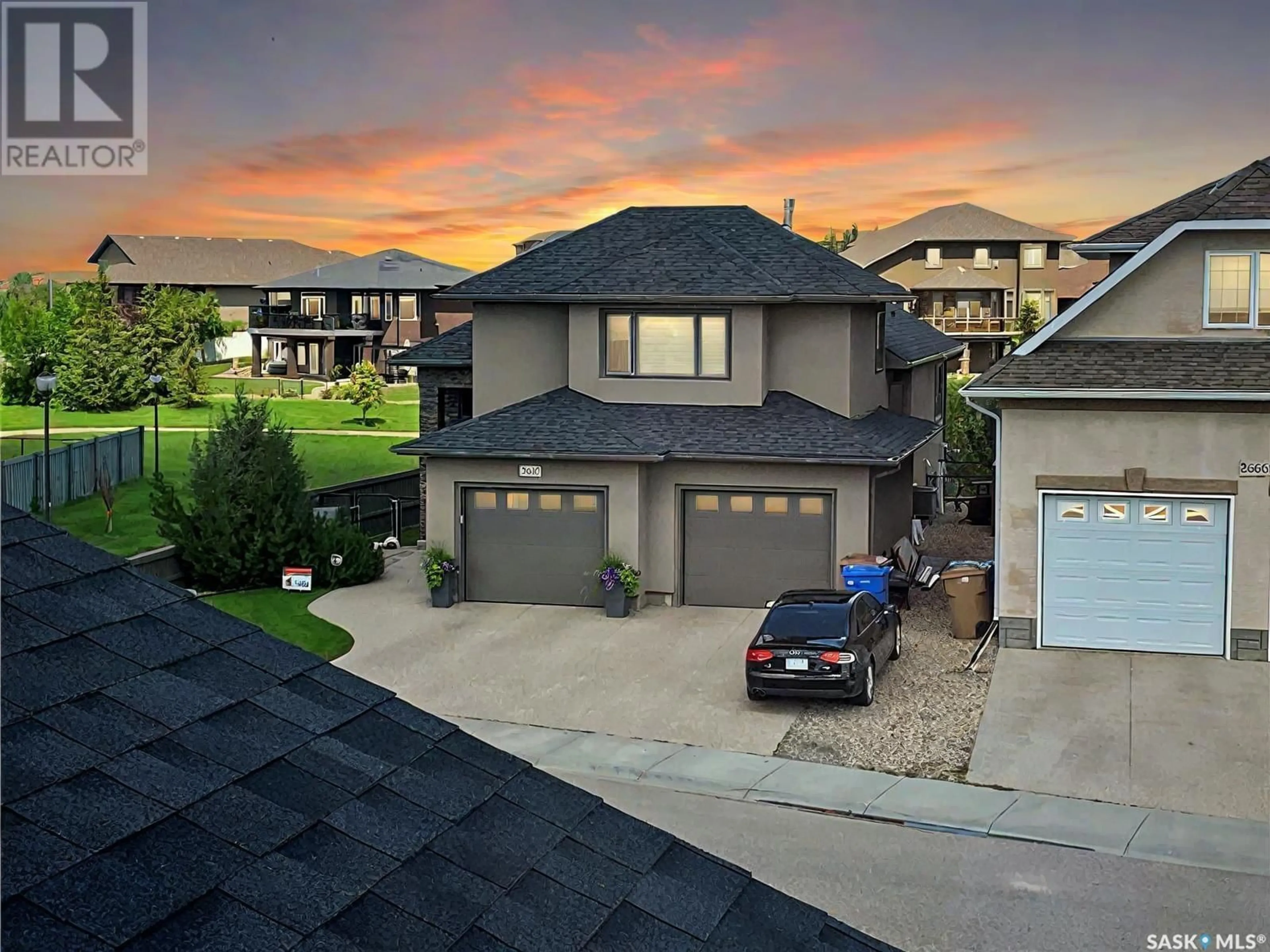 A pic from outside/outdoor area/front of a property/back of a property/a pic from drone, street for 2670 Sandringham CRESCENT, Regina Saskatchewan S4V3C6