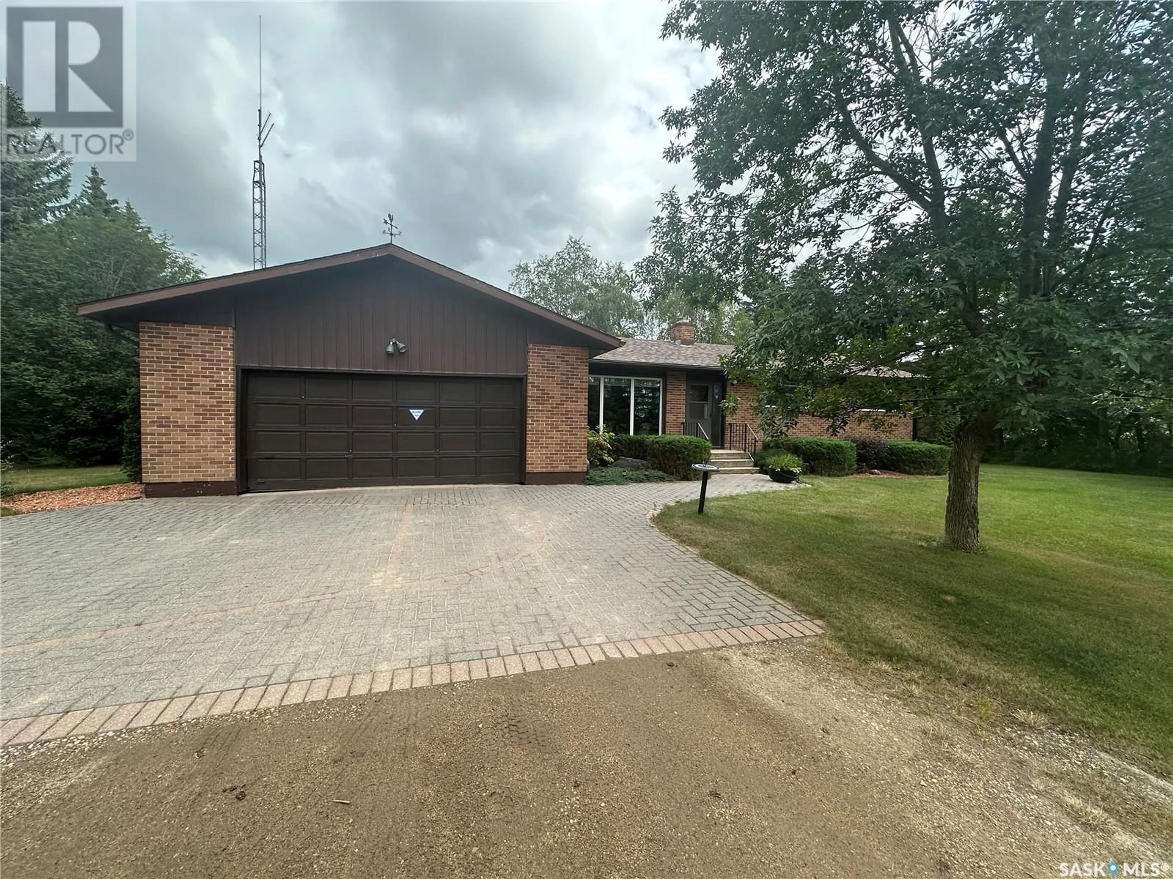 Home with brick exterior material, street for Boxall Acreage, Connaught Rm No. 457 Saskatchewan S0E1T0