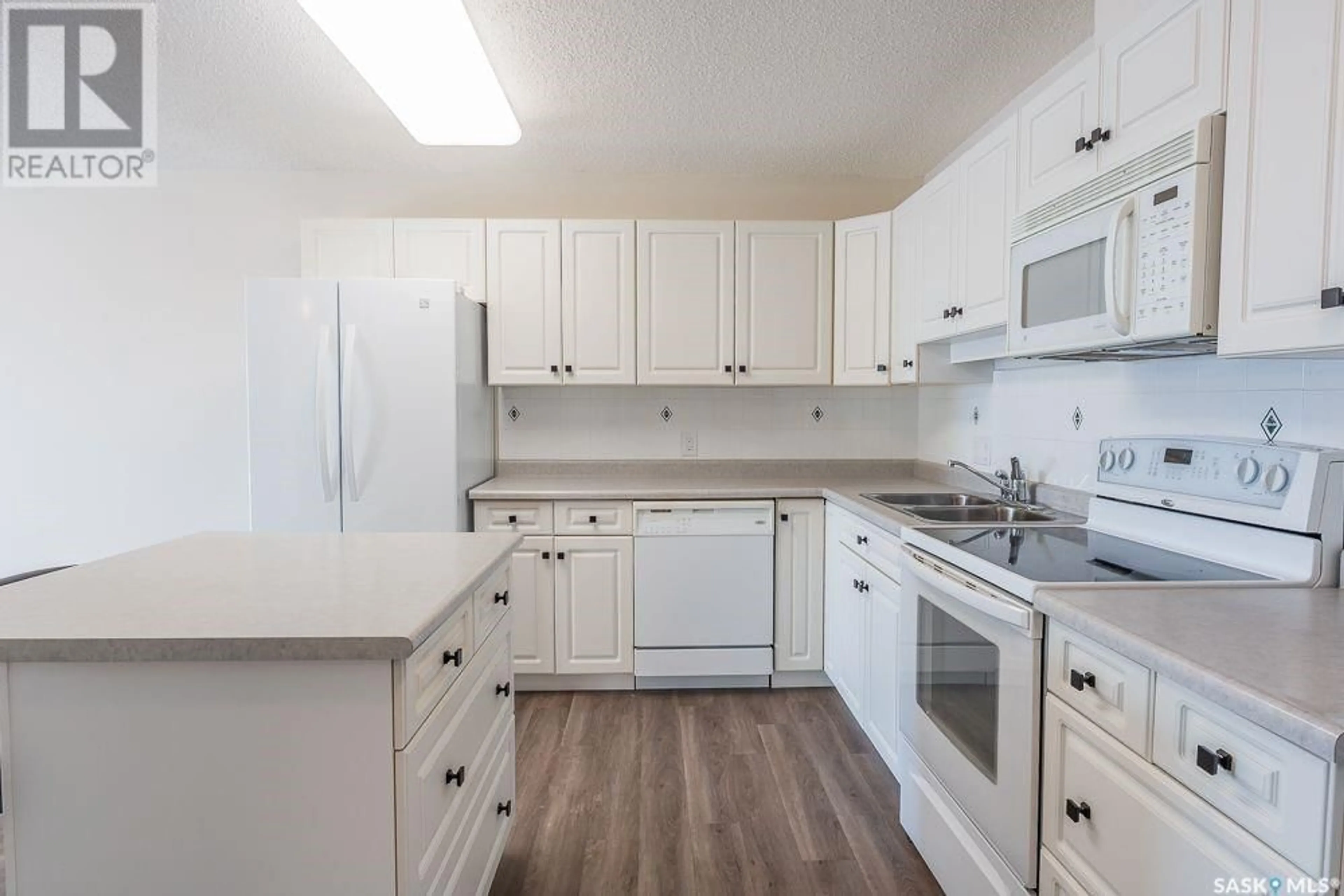 Standard kitchen, wood/laminate floor for 406 2501 1st AVENUE W, Prince Albert Saskatchewan S6V5A3