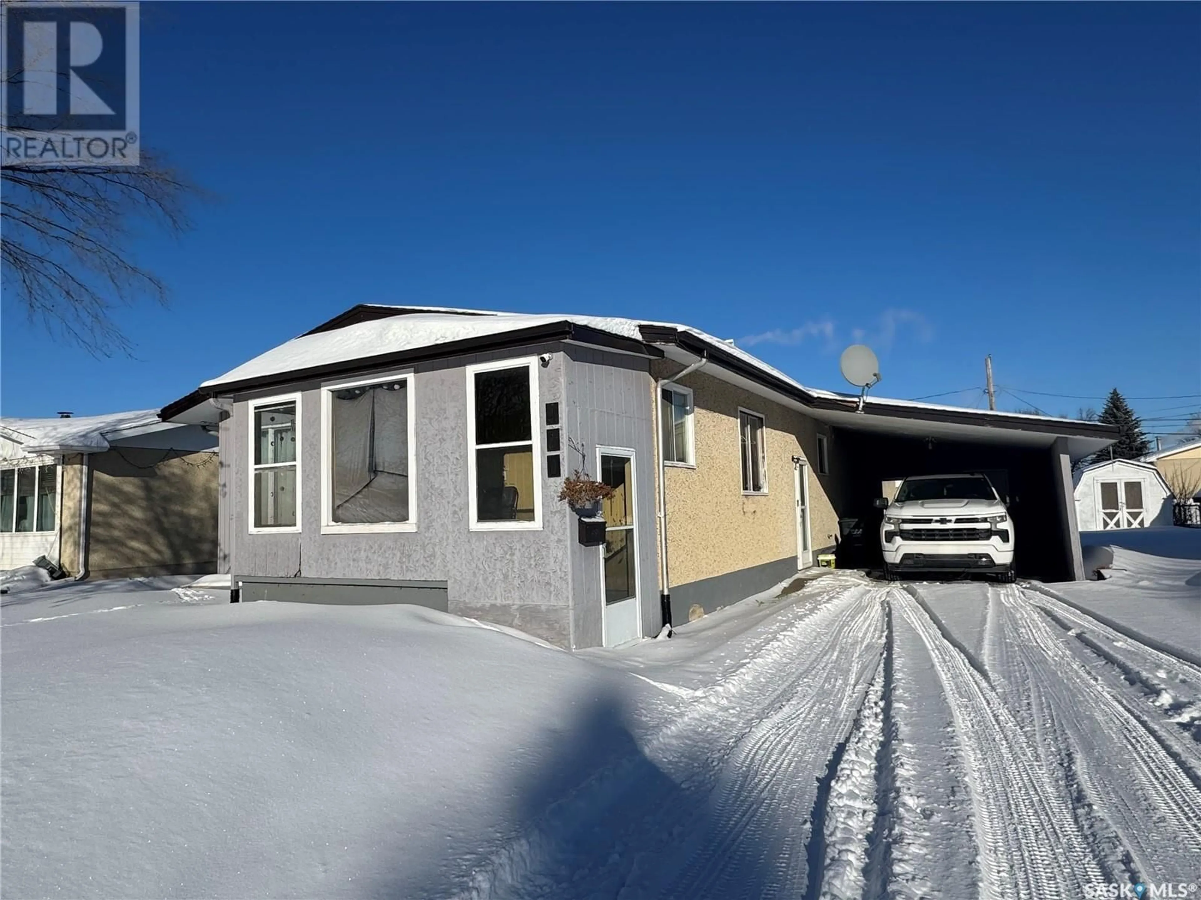 A pic from outside/outdoor area/front of a property/back of a property/a pic from drone, street for 460 29th STREET E, Prince Albert Saskatchewan S6V1Y7