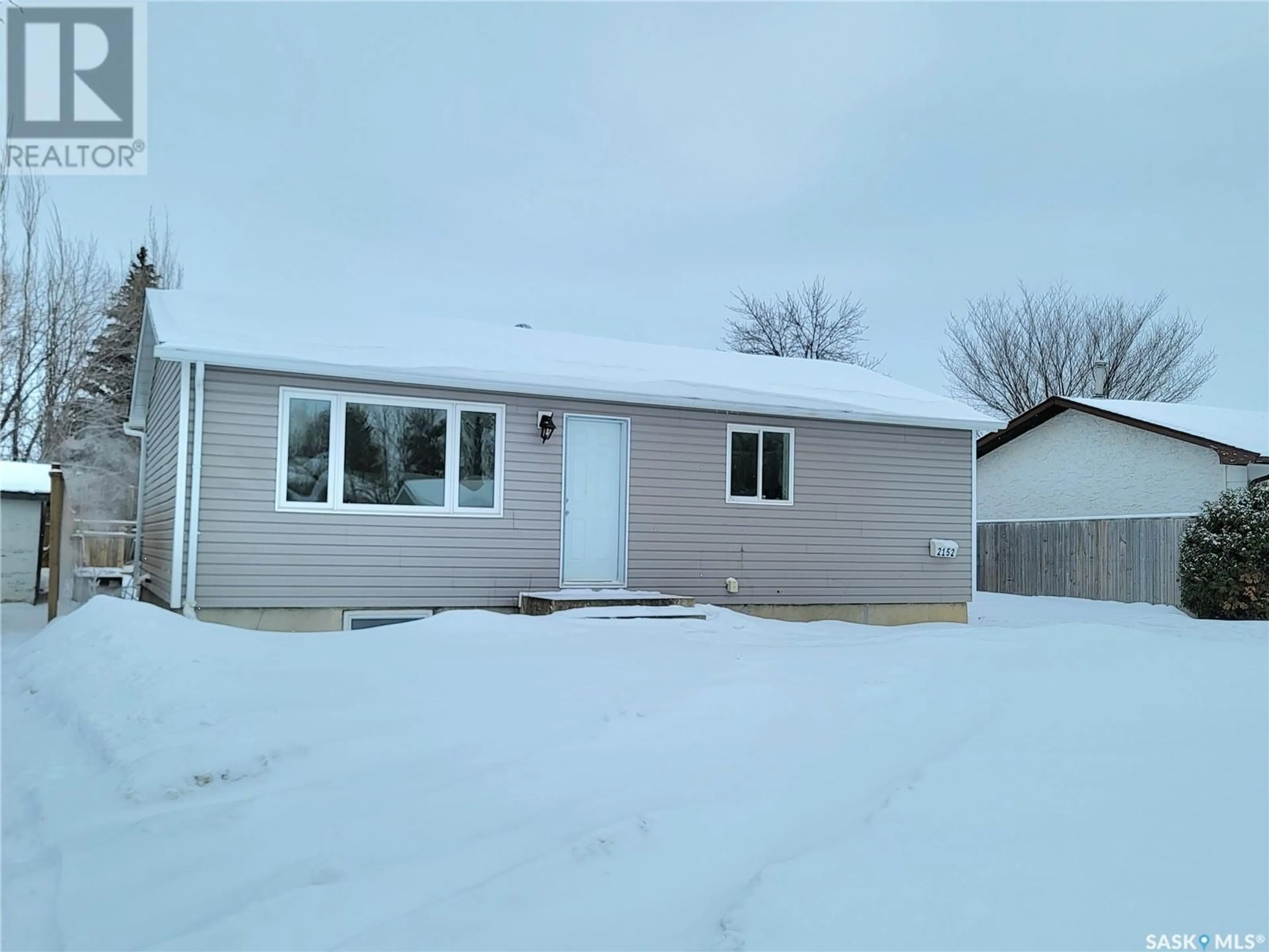 Home with vinyl exterior material, street for 2152 Deans CRESCENT, North Battleford Saskatchewan S9A3H9