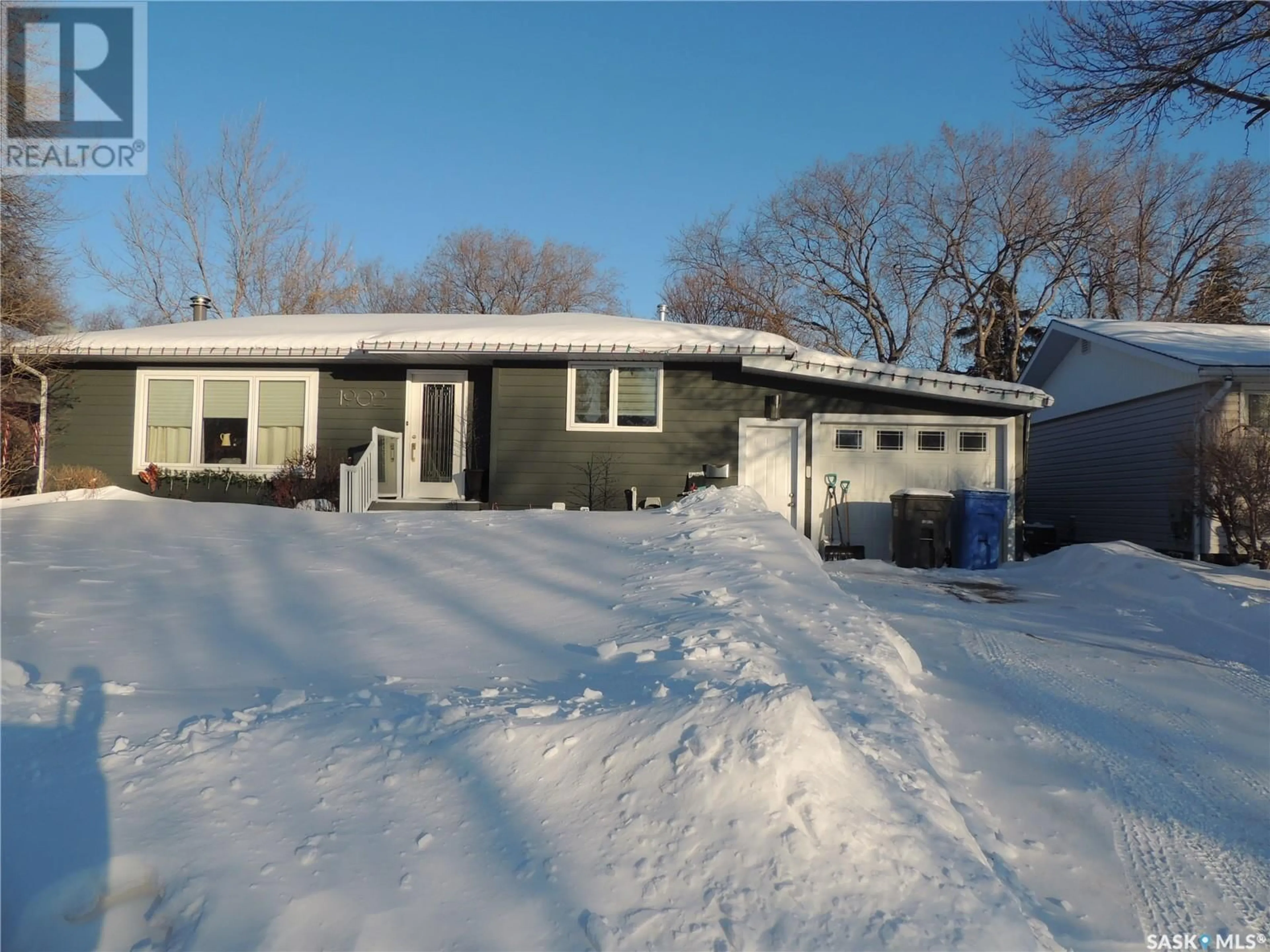 Home with vinyl exterior material, street for 1902 DYER ROAD, Estevan Saskatchewan S4A1Z5