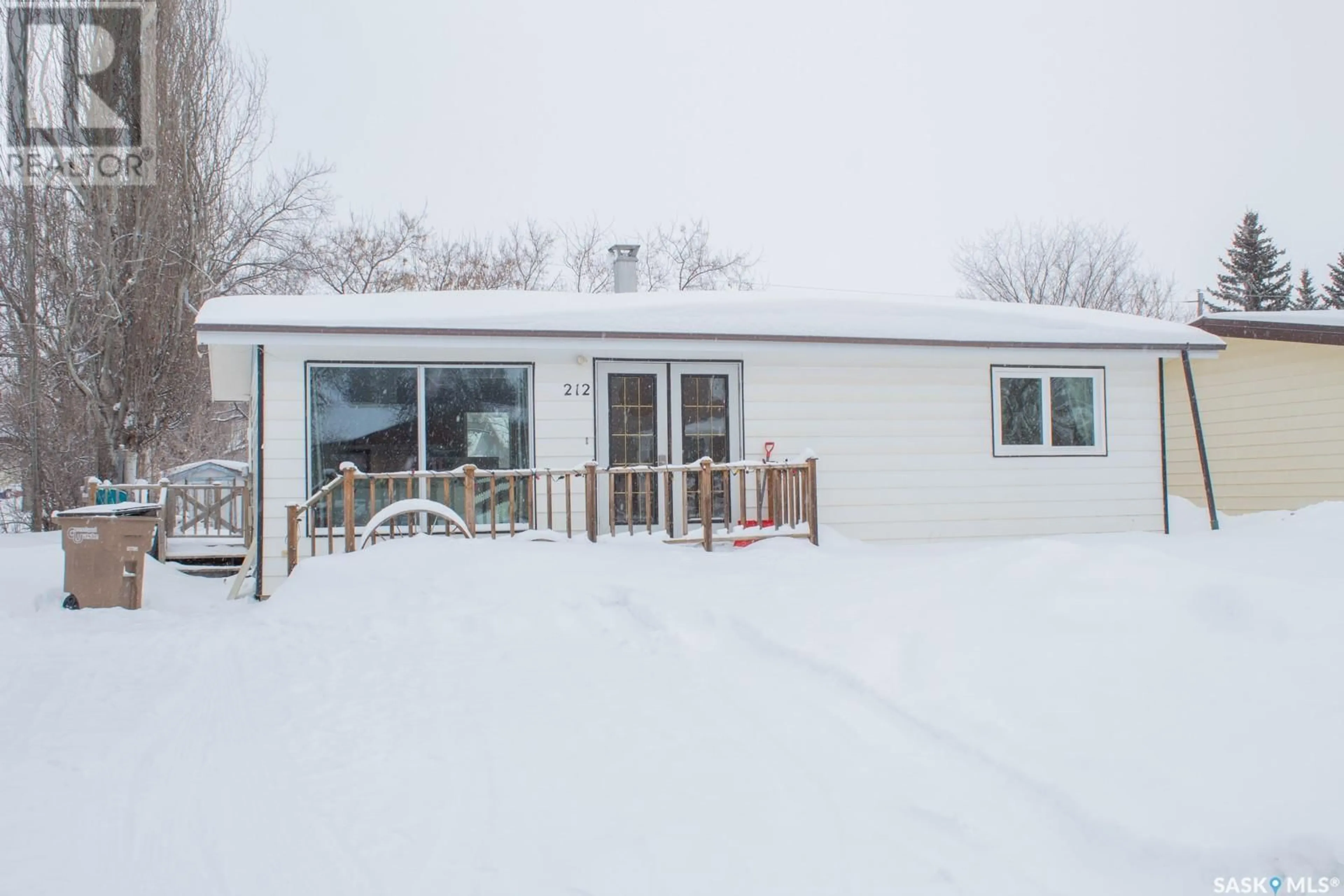 A pic from outside/outdoor area/front of a property/back of a property/a pic from drone, unknown for 212 3rd AVENUE S, Melfort Saskatchewan S0E1A0