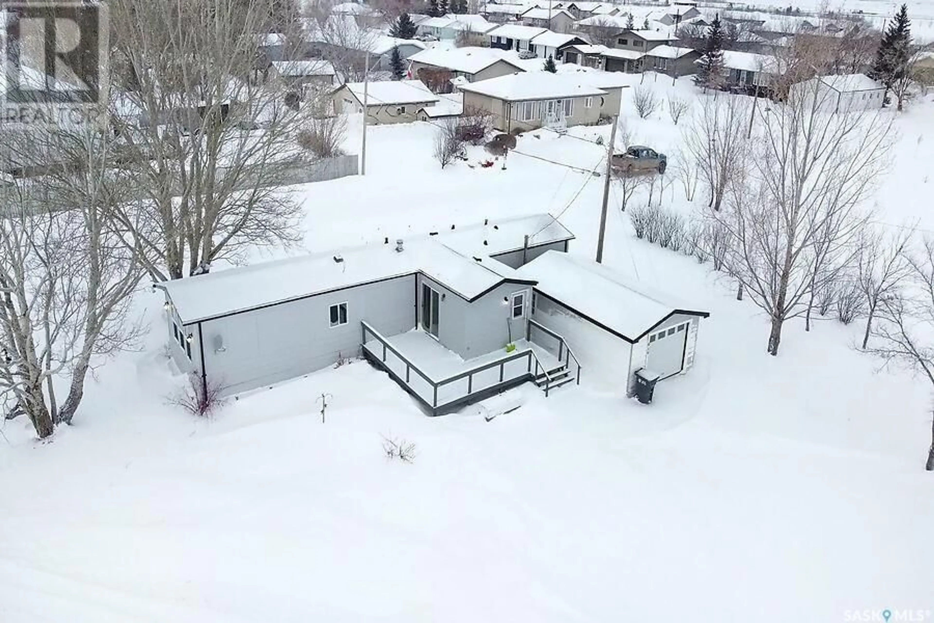 A pic from outside/outdoor area/front of a property/back of a property/a pic from drone, building for 819 Railway AVENUE S, Bethune Saskatchewan S0G0H0