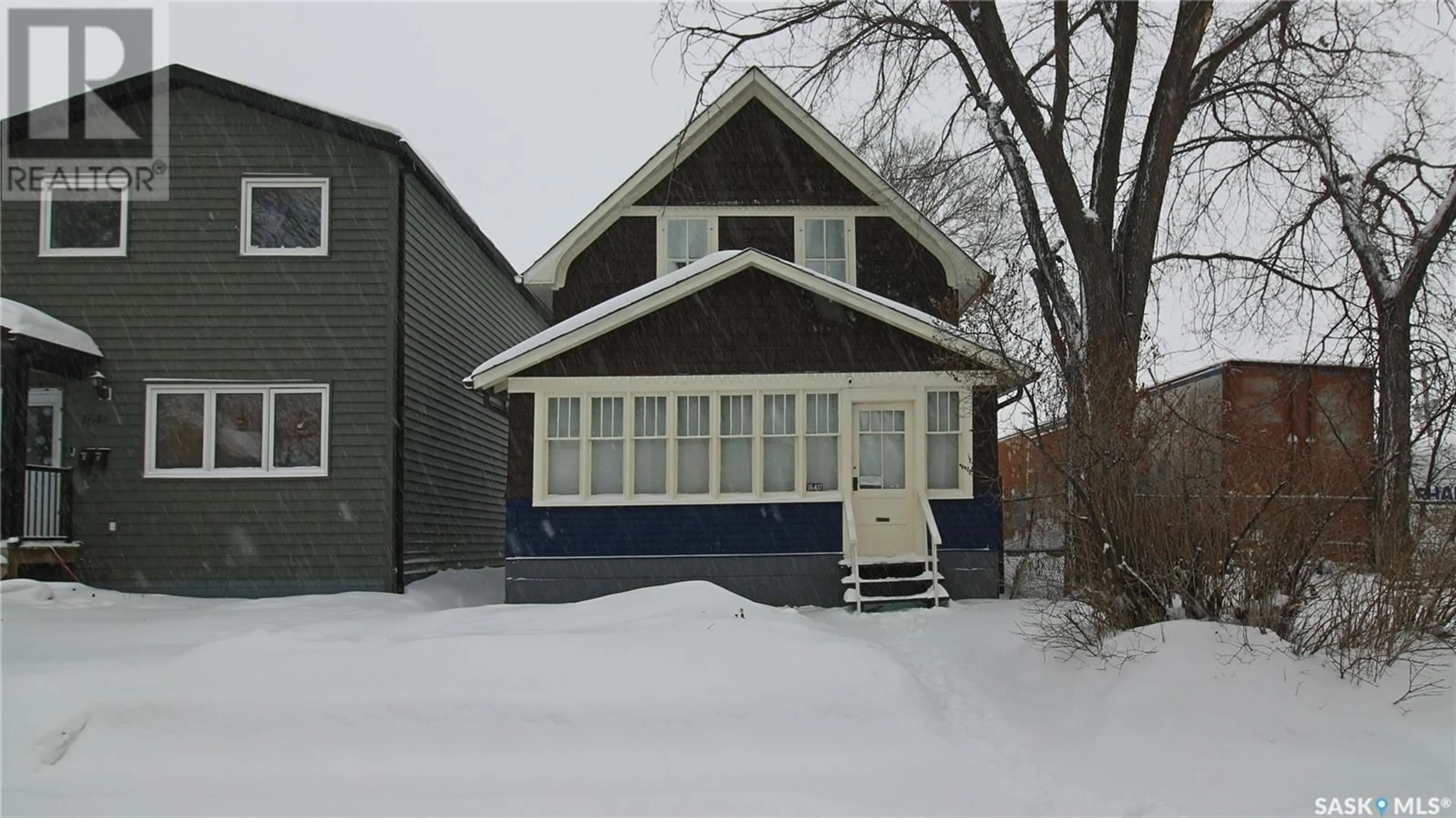 Home with vinyl exterior material, street for 1640 Ottawa STREET, Regina Saskatchewan S4P1N9