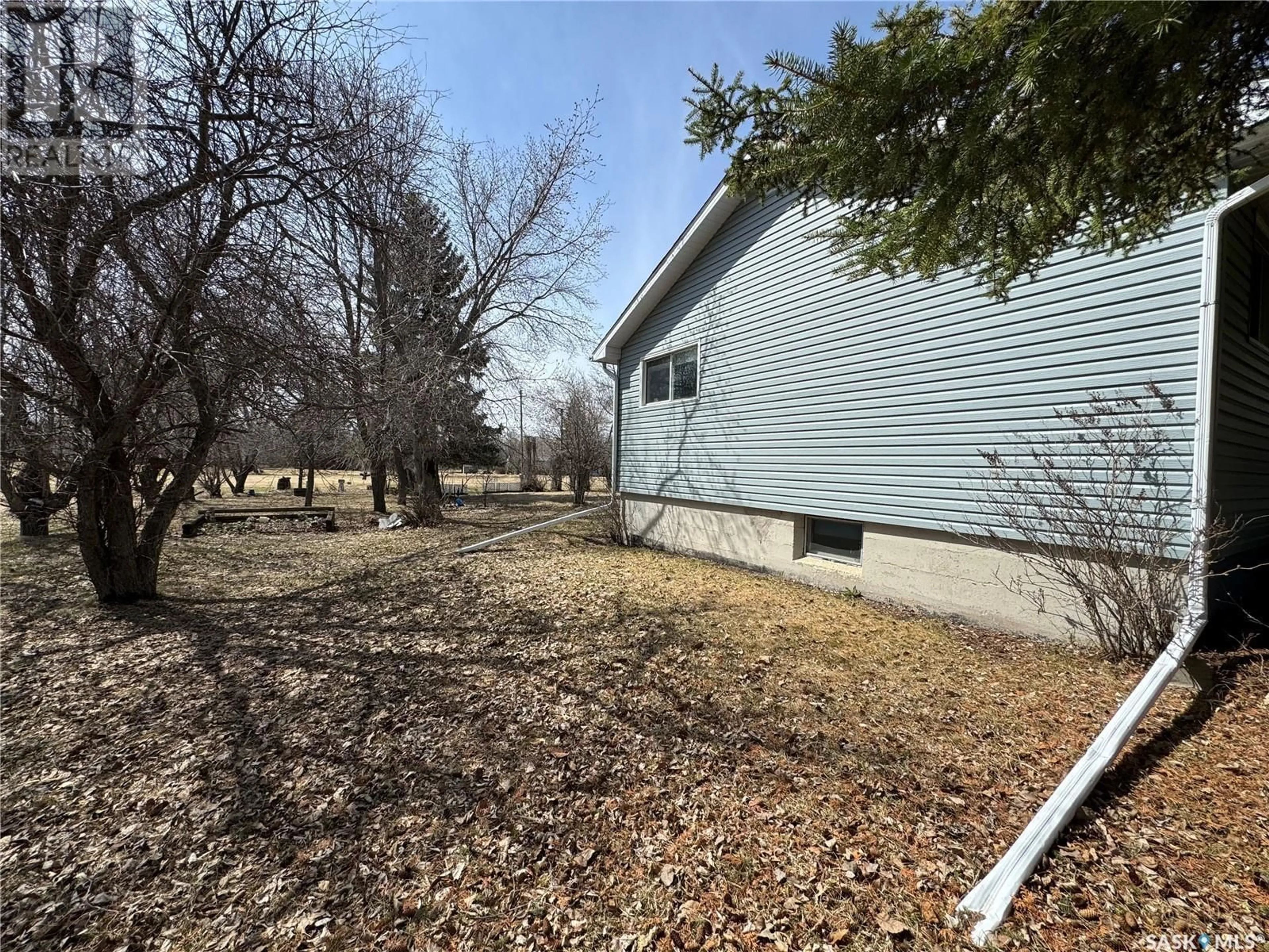 A pic from outside/outdoor area/front of a property/back of a property/a pic from drone, street for 210 Railway AVENUE, Hazel Dell Saskatchewan S0A1G0