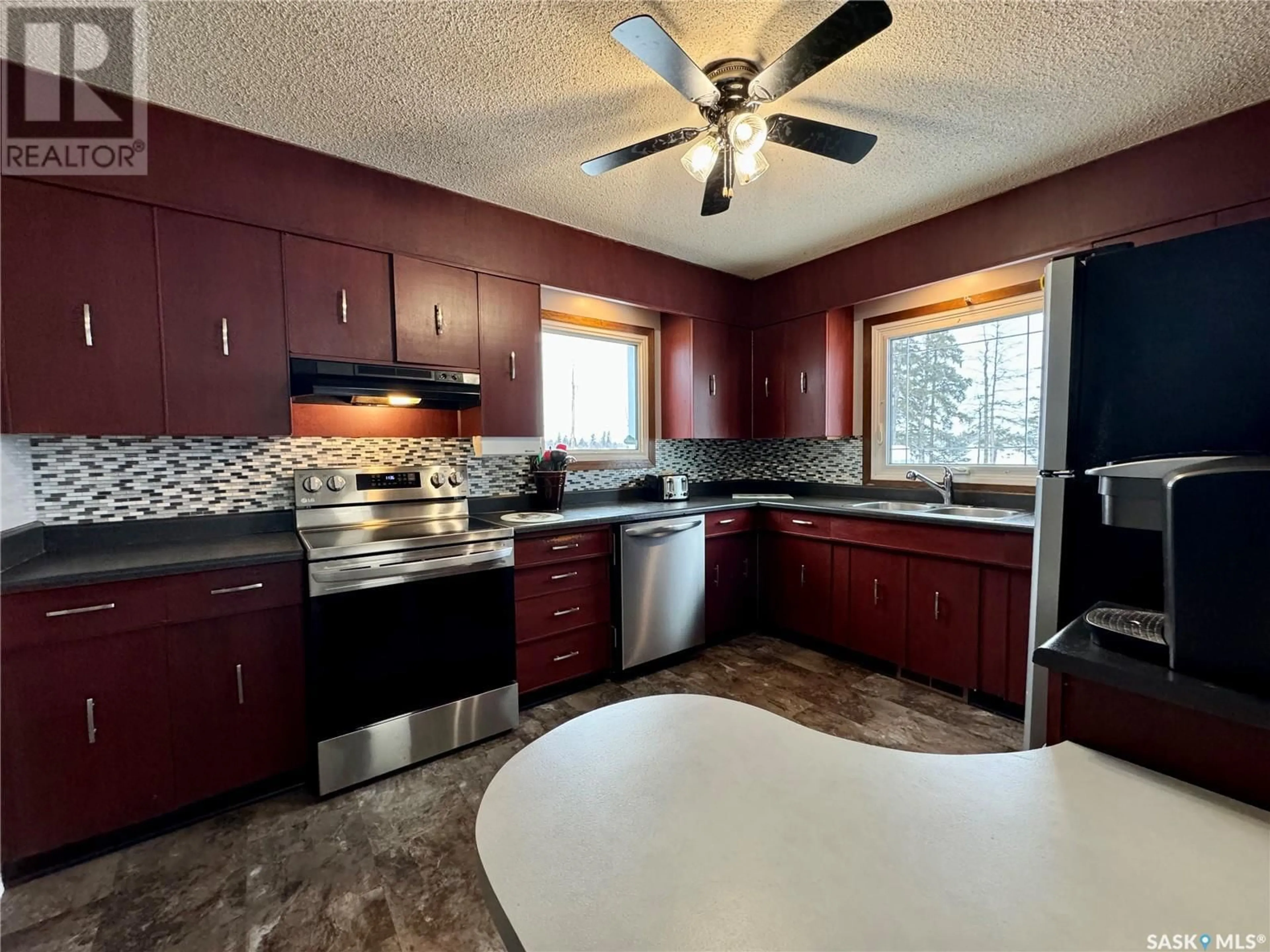 Open concept kitchen, ceramic/tile floor for JANSEN ACREAGE, Clayton Rm No. 333 Saskatchewan S3N3X0