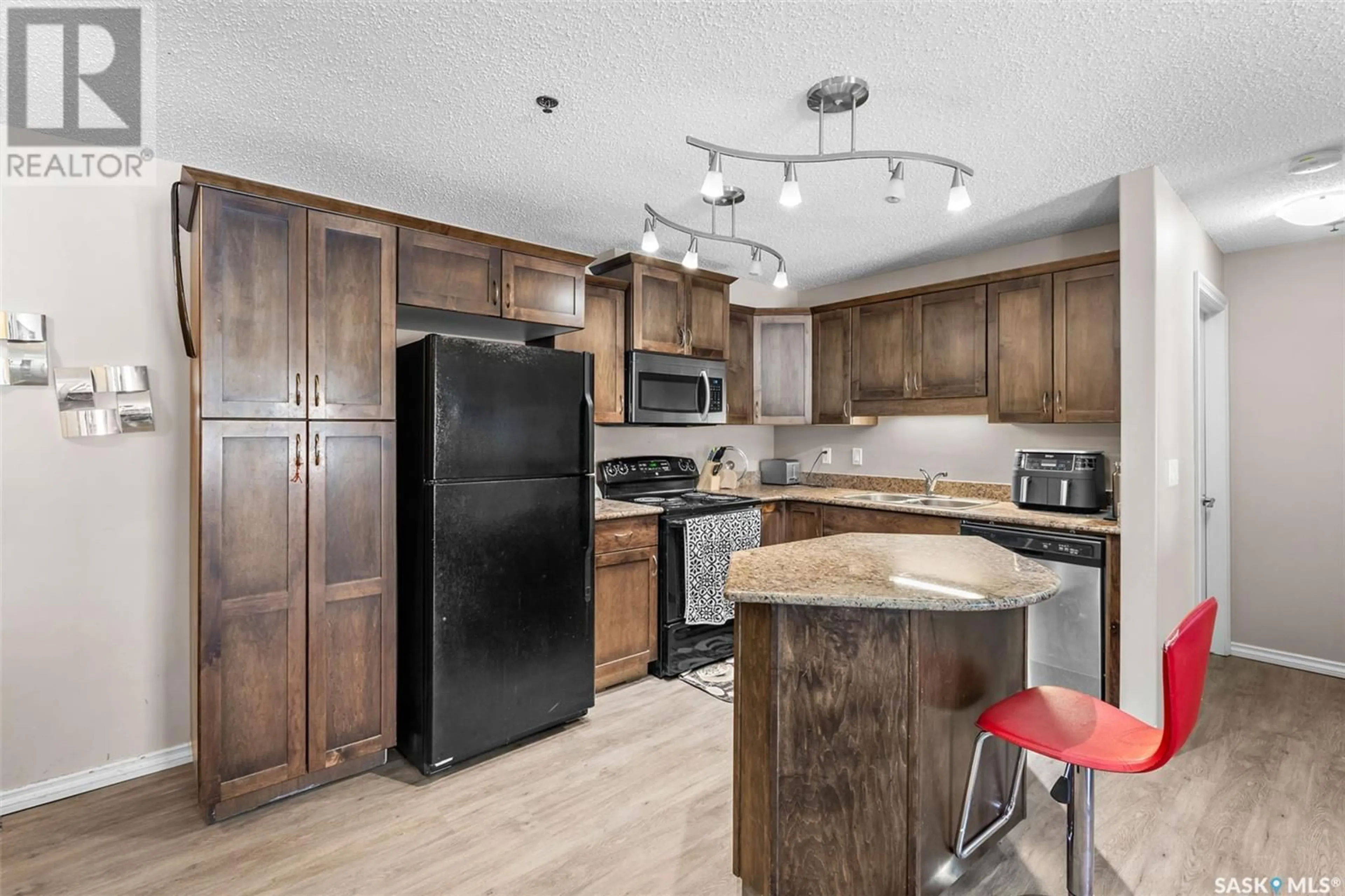 Open concept kitchen, unknown for 105A 103 Wellman CRESCENT, Saskatoon Saskatchewan S7T0C1