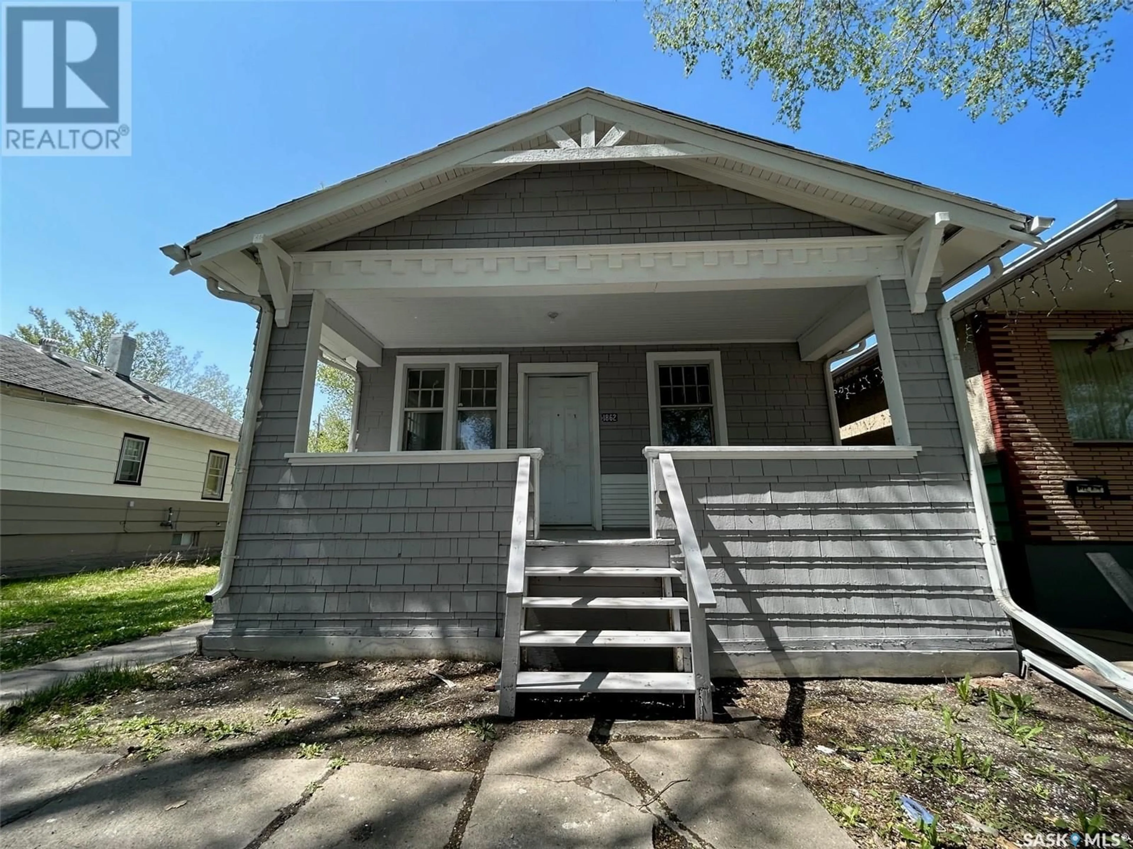 Home with vinyl exterior material, street for 1862 Toronto STREET, Regina Saskatchewan S4P1M6