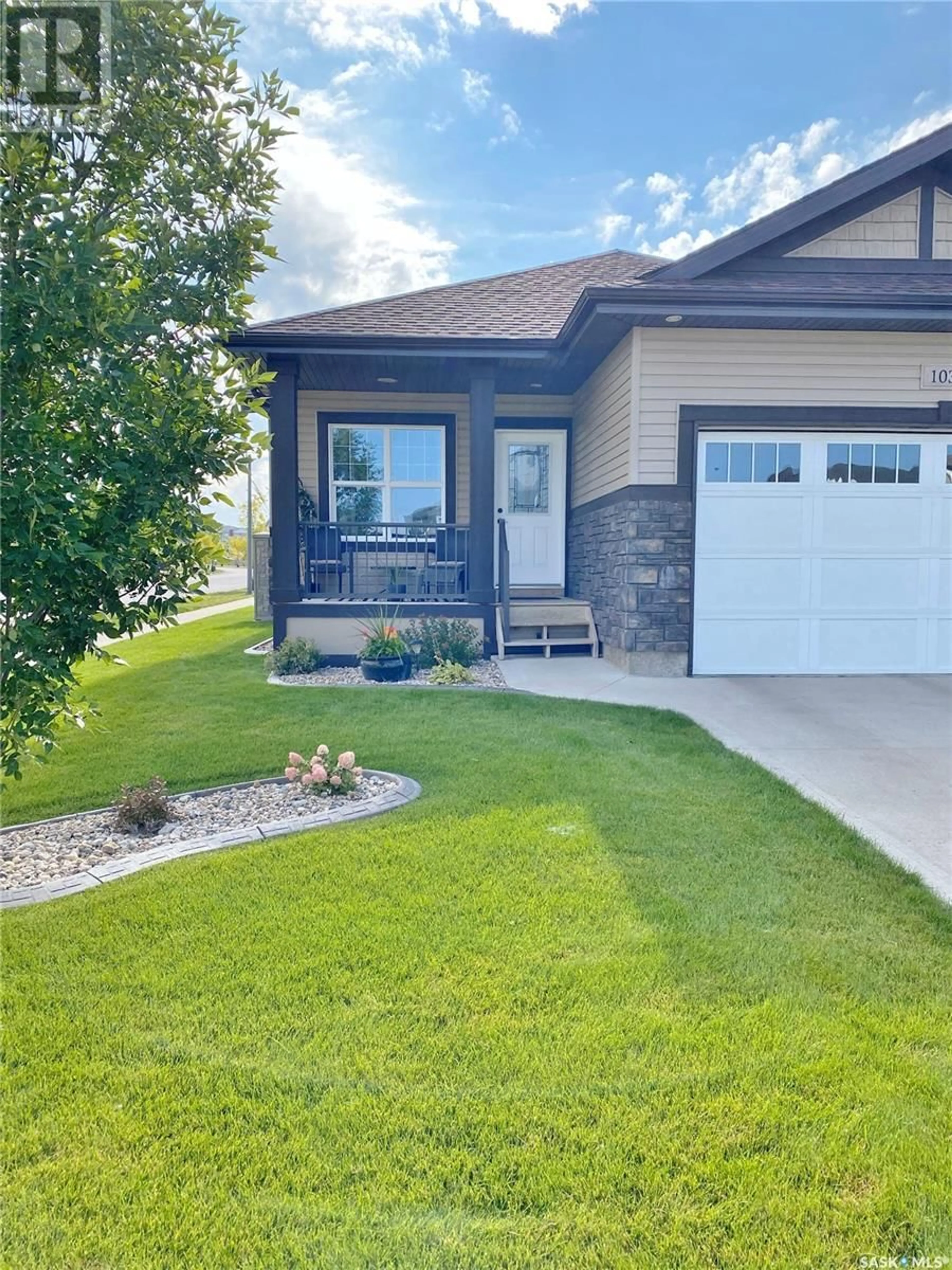 Home with vinyl exterior material, street for 103 Pringle CRESCENT, Saskatoon Saskatchewan S7T0S3