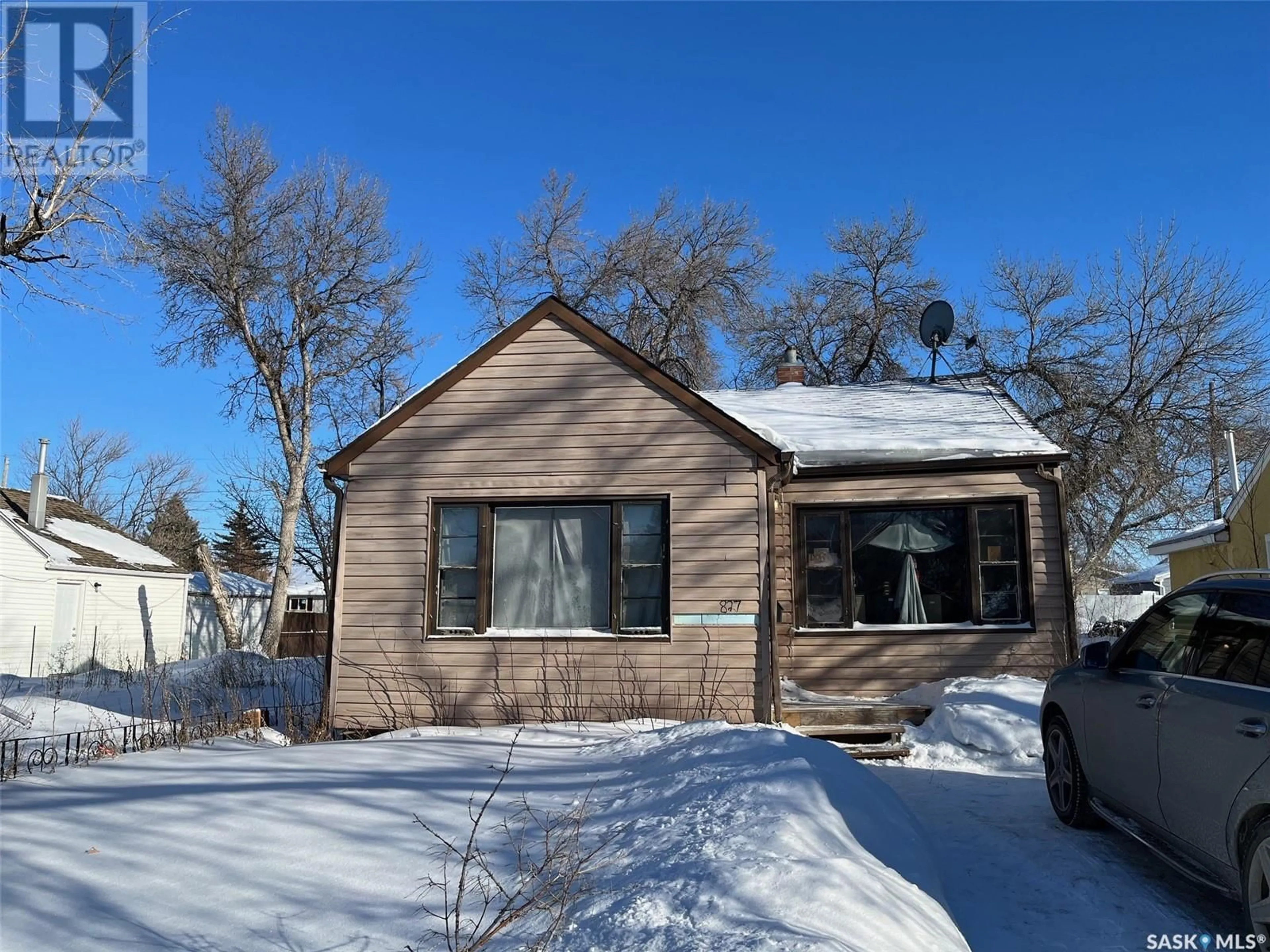 Home with vinyl exterior material, street for 827 Cameron STREET, Regina Saskatchewan S4T2S4