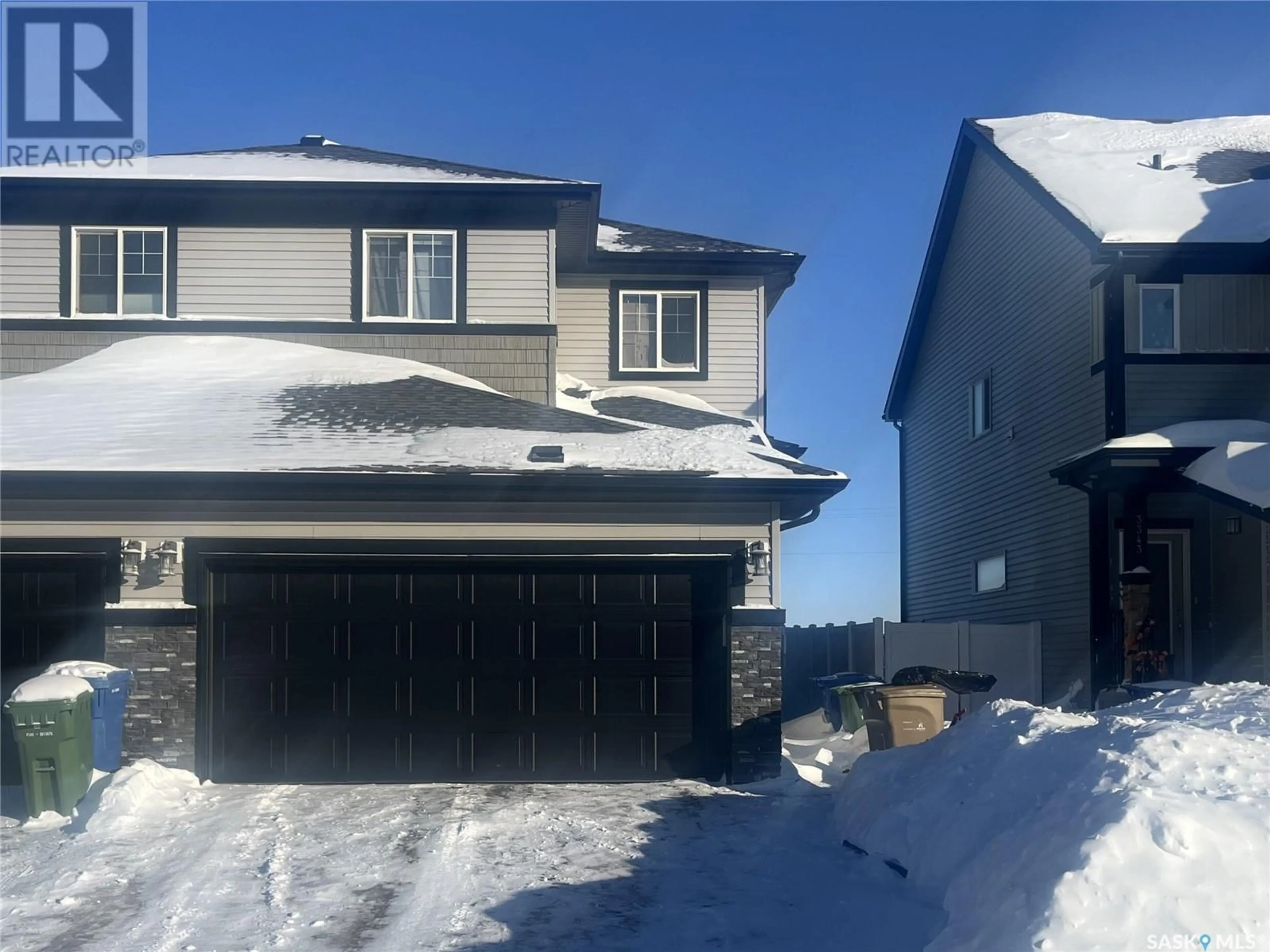 A pic from outside/outdoor area/front of a property/back of a property/a pic from drone, street for 3339 Green Turtle ROAD, Regina Saskatchewan S4V3N6