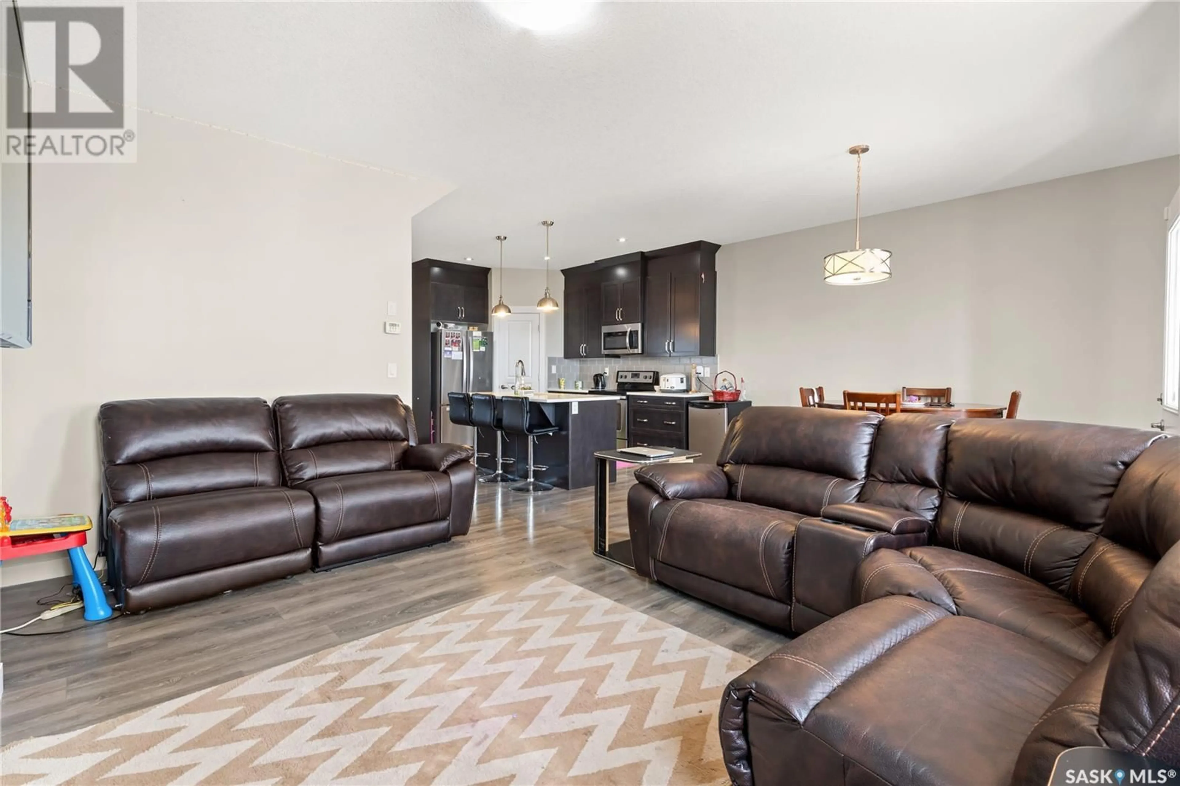 Living room with furniture, unknown for 3339 Green Turtle ROAD, Regina Saskatchewan S4V3N6