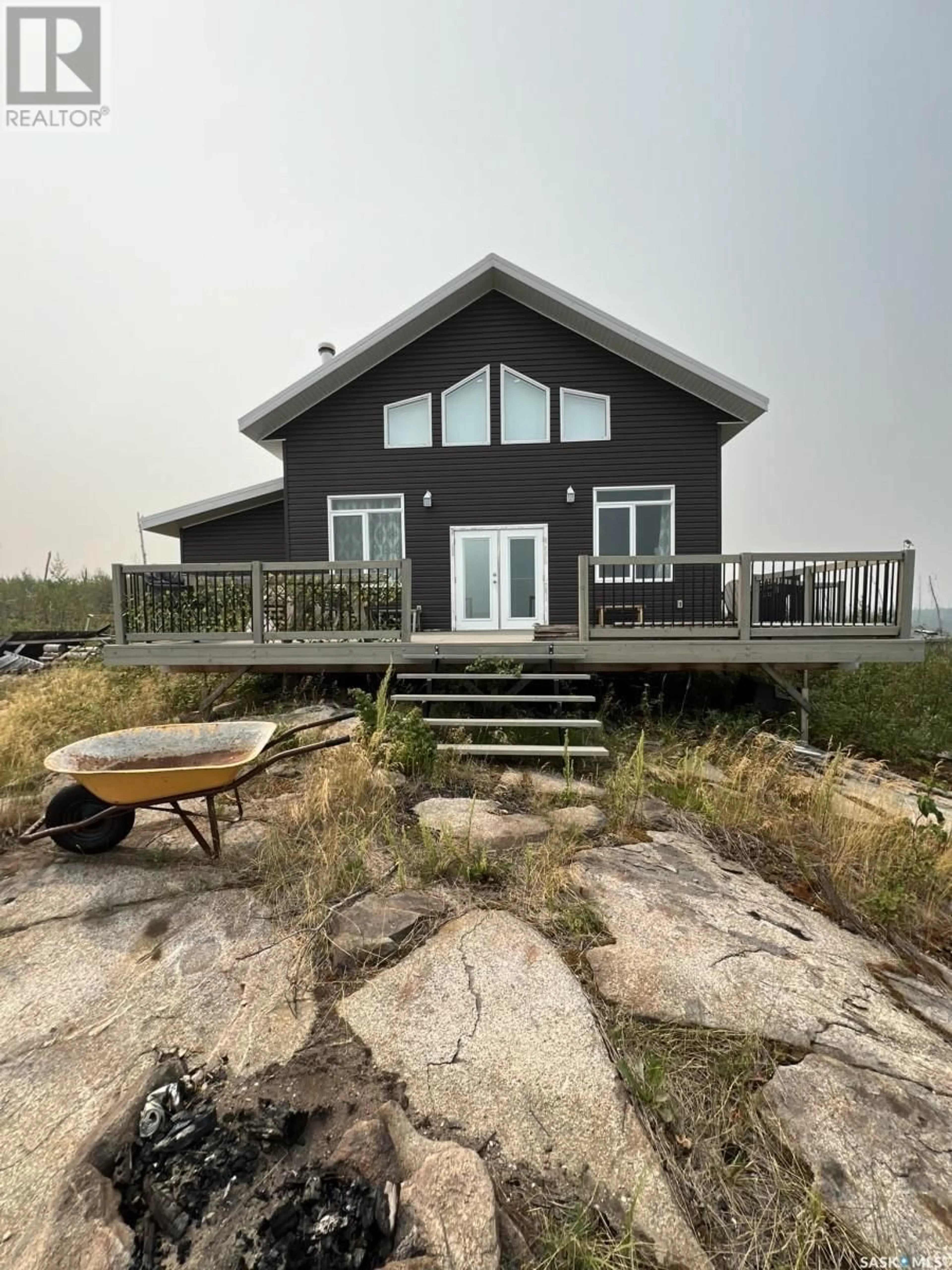 Home with vinyl exterior material, water/lake/river/ocean view for EWEN BAY CABIN, Lac La Ronge Provincial Park Saskatchewan S0J1L0