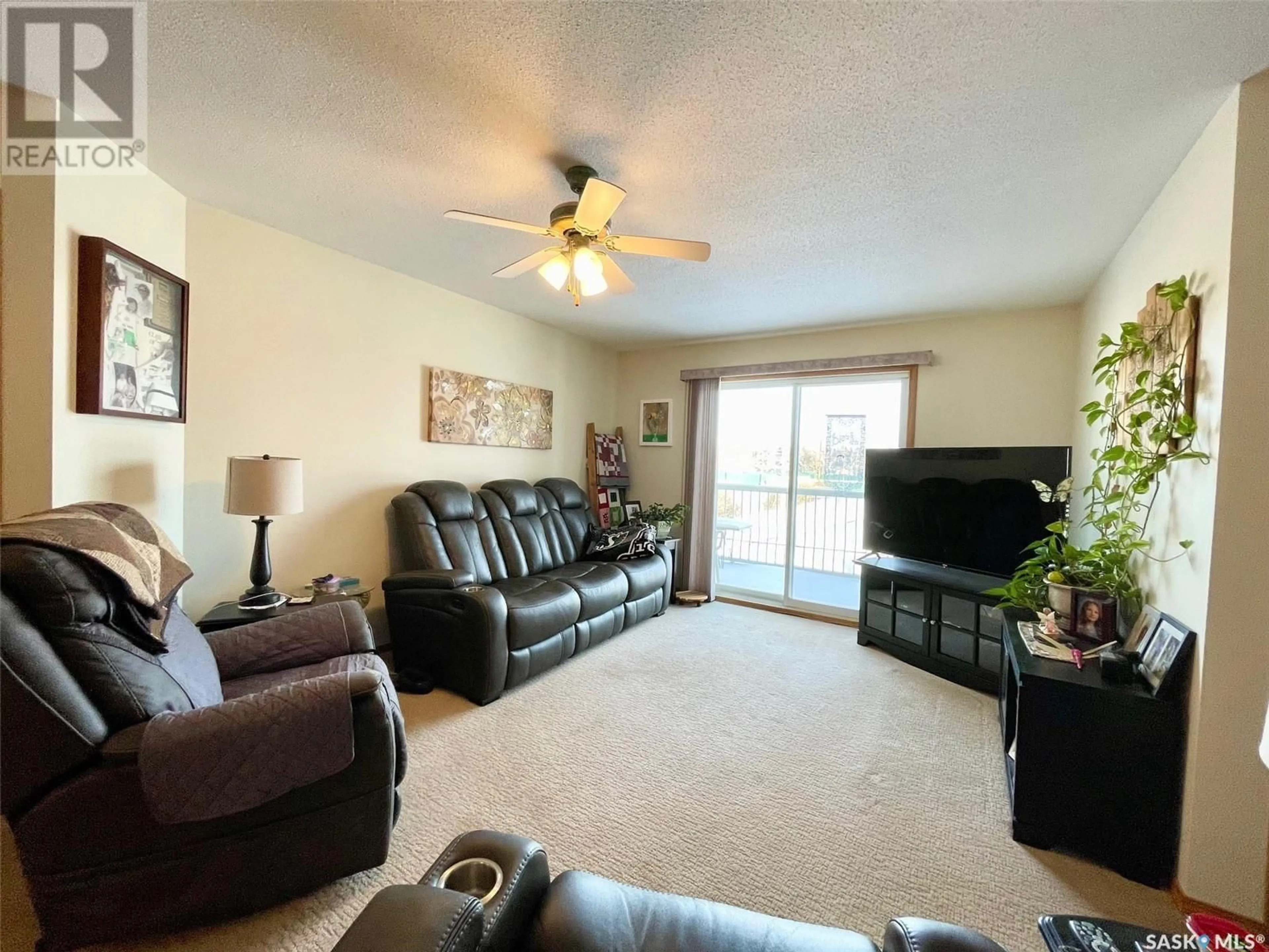 Living room with furniture, unknown for 204 605 3rd AVENUE NE, Moose Jaw Saskatchewan S6H0L6