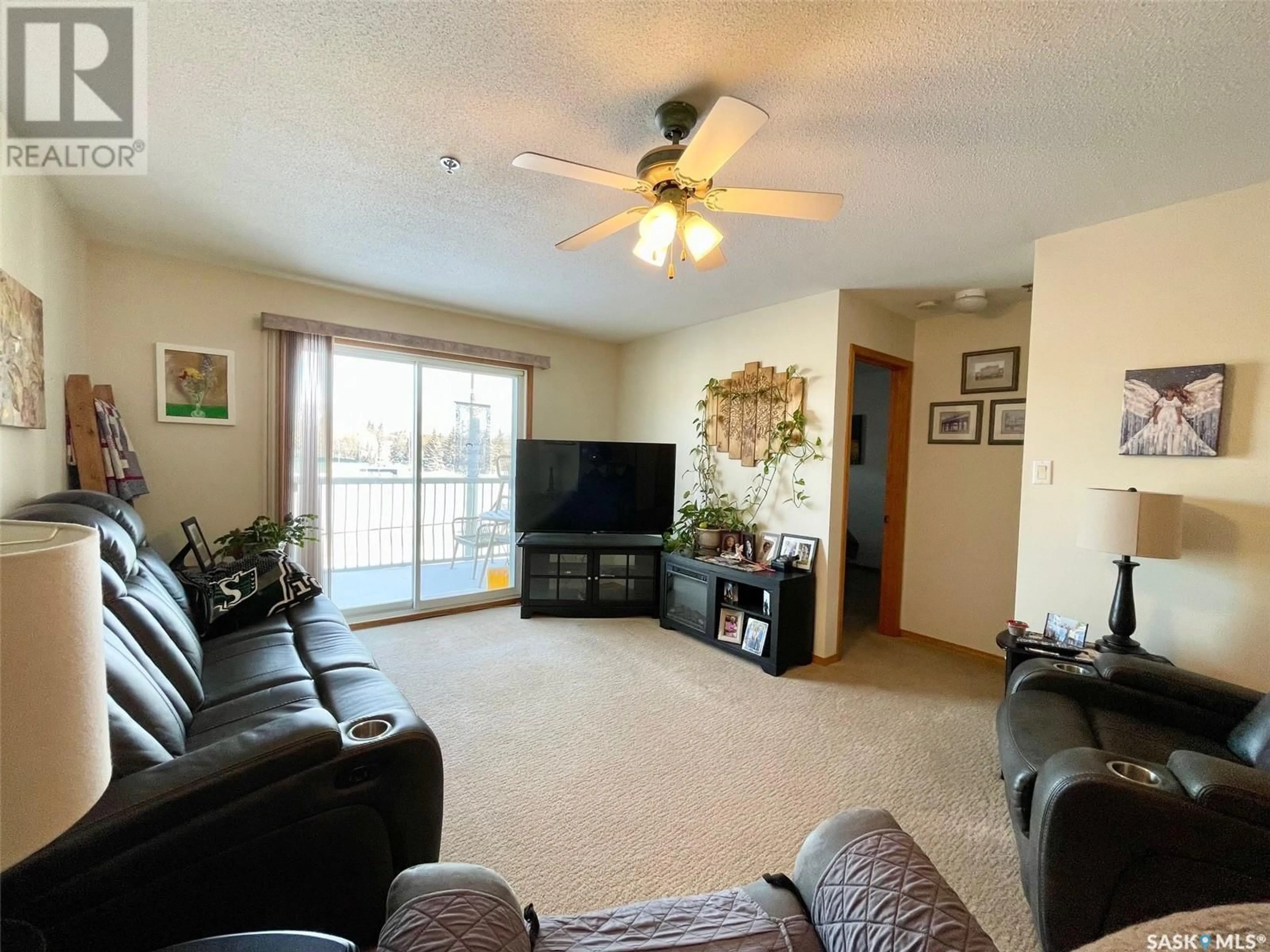 Living room with furniture, unknown for 204 605 3rd AVENUE NE, Moose Jaw Saskatchewan S6H0L6