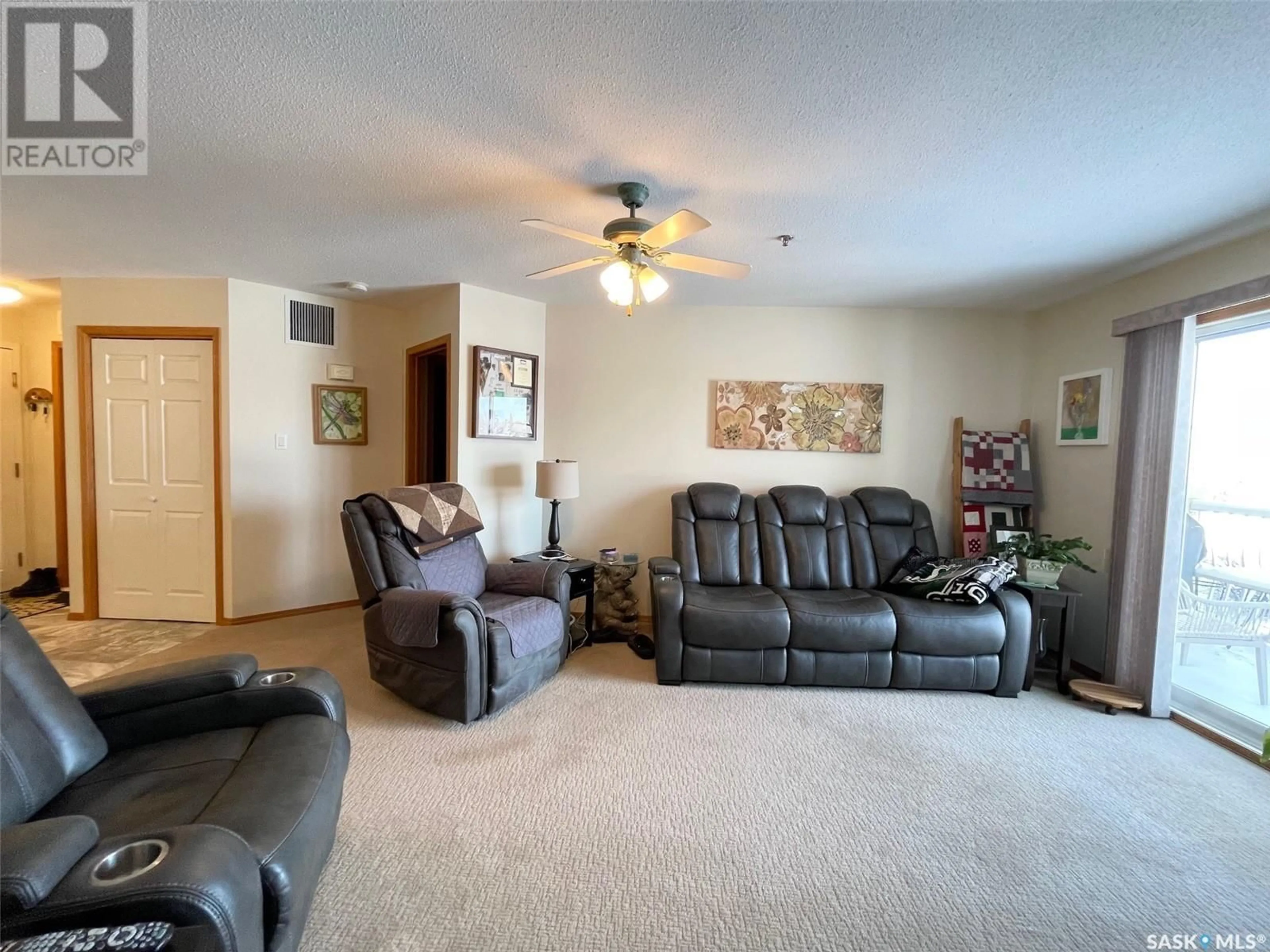 Living room with furniture, unknown for 204 605 3rd AVENUE NE, Moose Jaw Saskatchewan S6H0L6