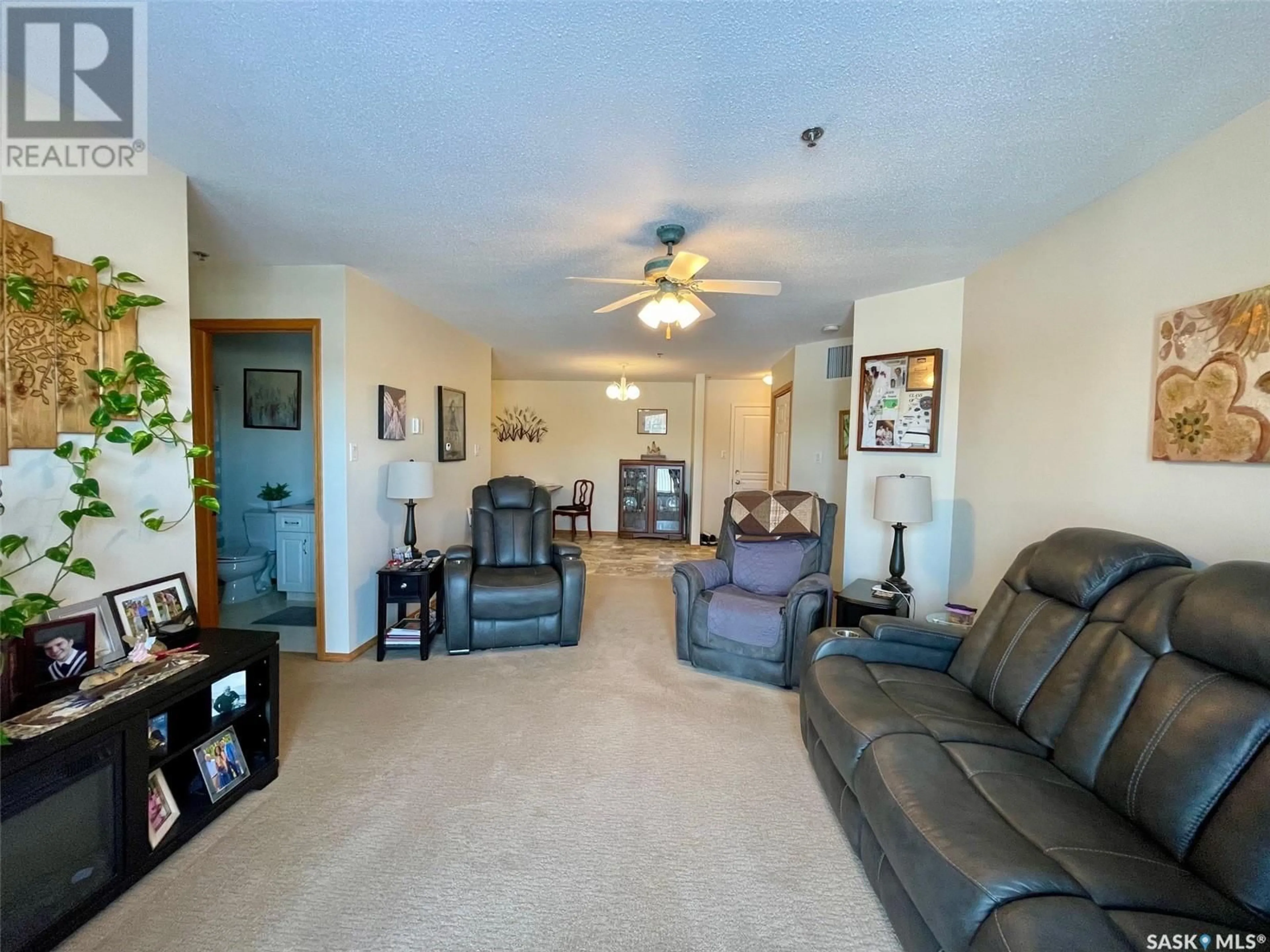 Living room with furniture, unknown for 204 605 3rd AVENUE NE, Moose Jaw Saskatchewan S6H0L6