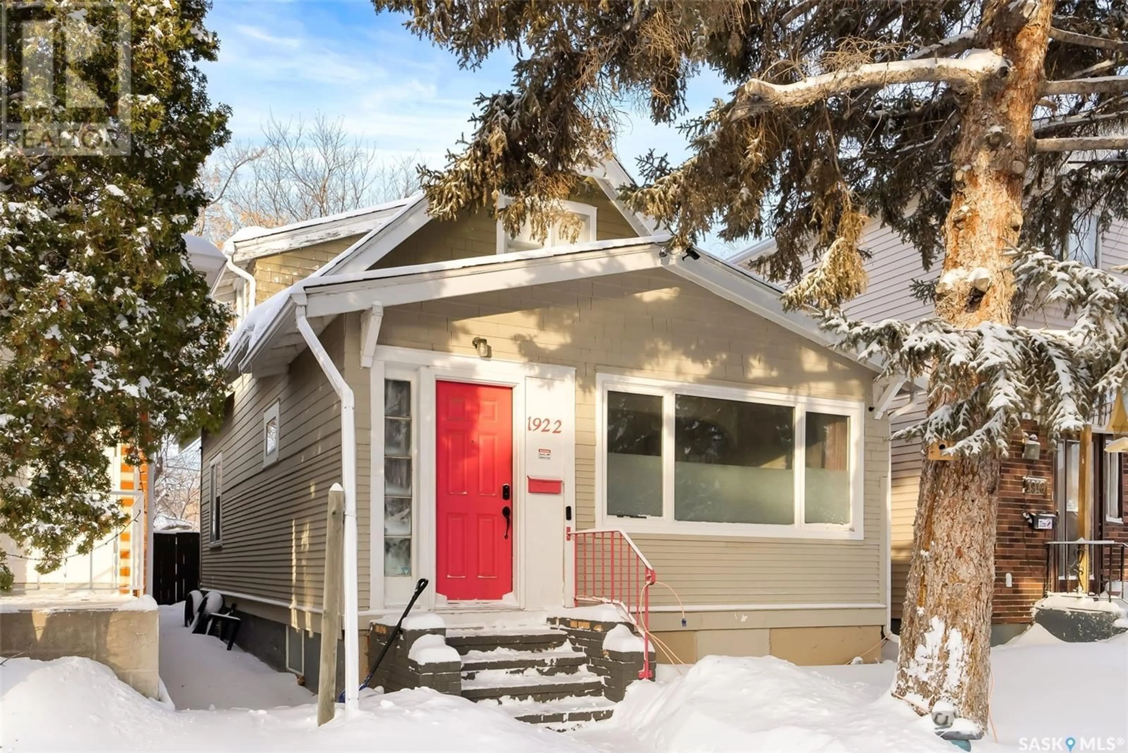 Home with vinyl exterior material, street for 1922 Atkinson STREET, Regina Saskatchewan S4N3W5