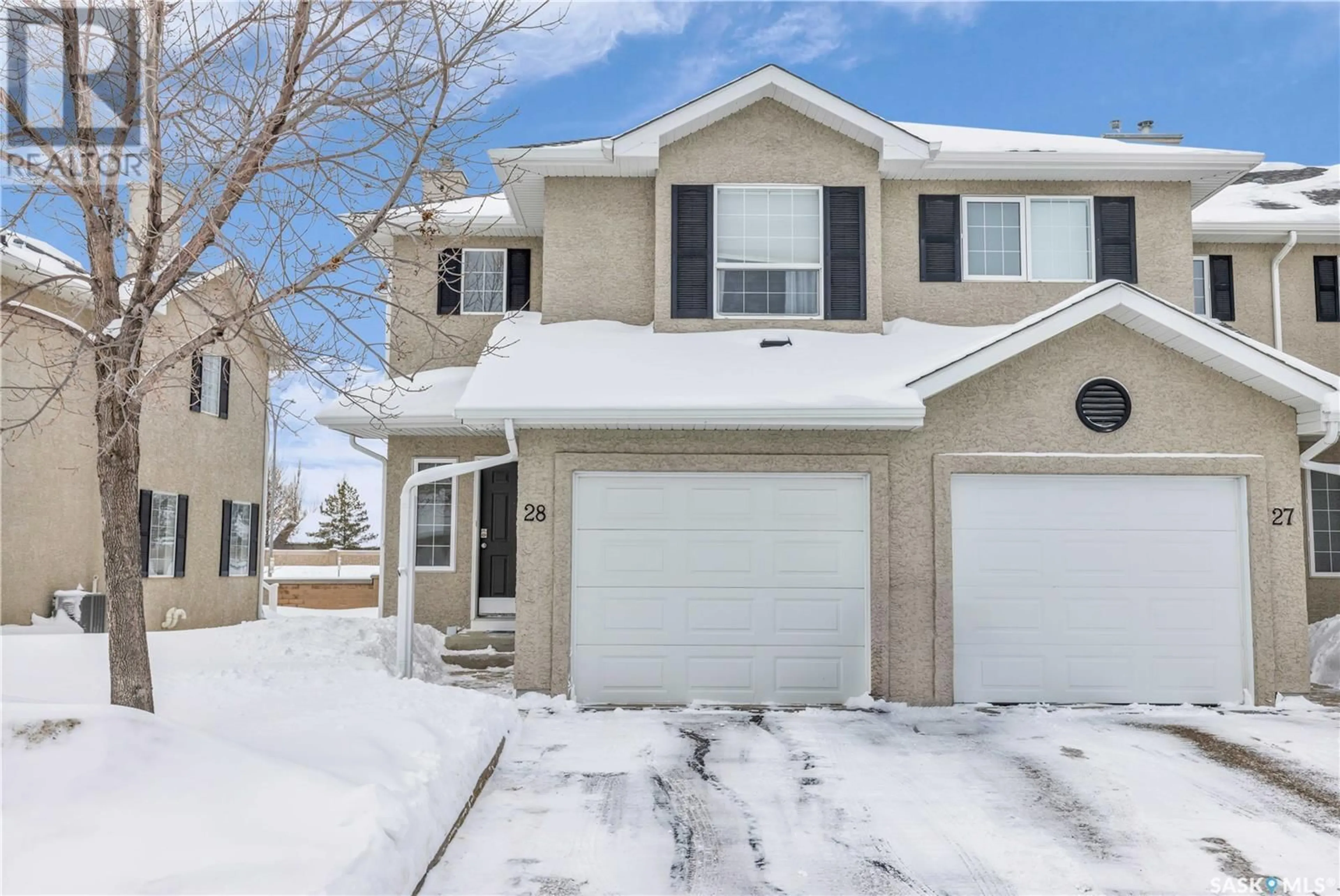 Home with vinyl exterior material, street for 28 103 Banyan CRESCENT, Saskatoon Saskatchewan S7V1G2