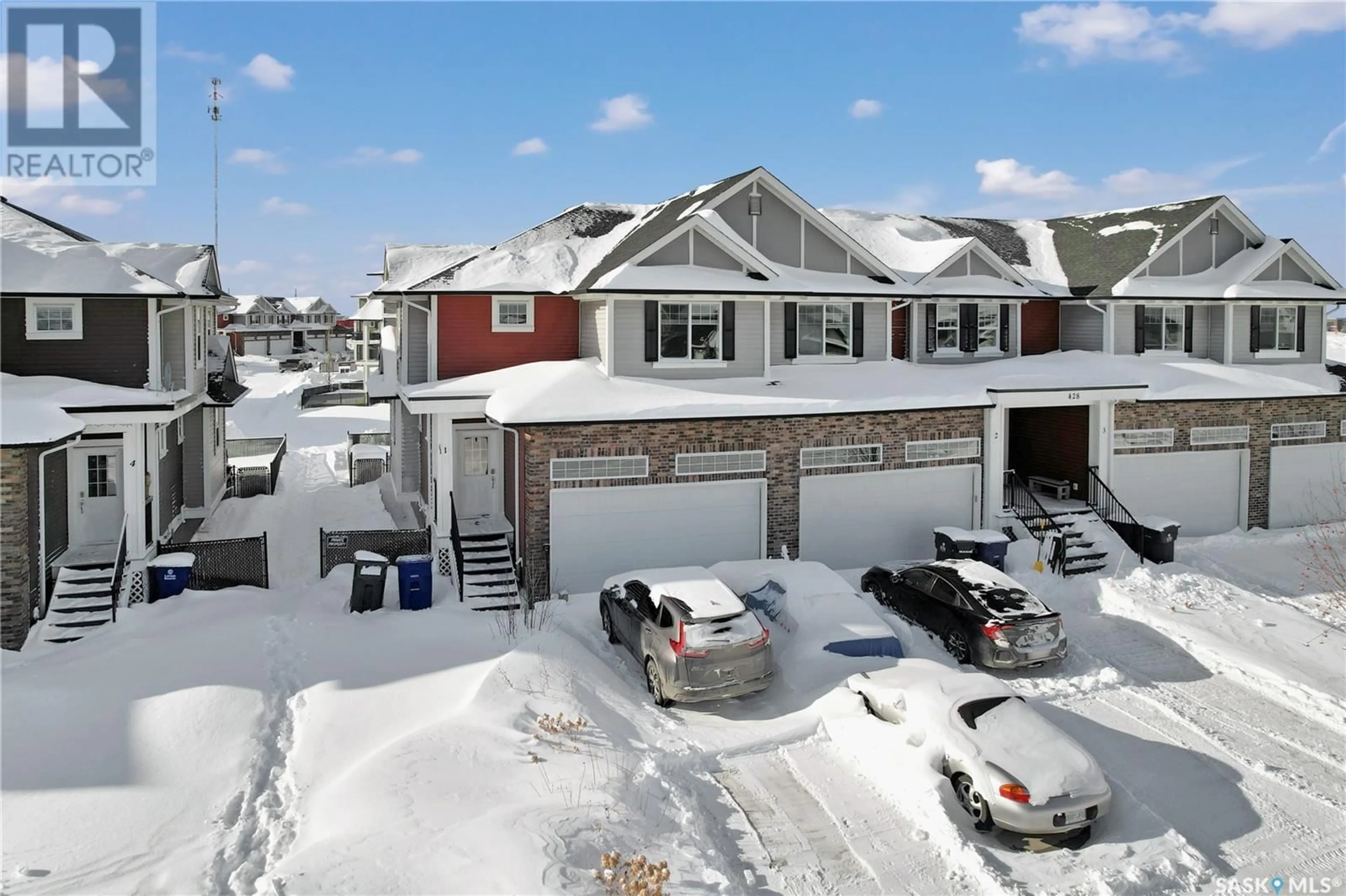 A pic from outside/outdoor area/front of a property/back of a property/a pic from drone, unknown for 1 428 Snead CRESCENT, Warman Saskatchewan S0K4S1