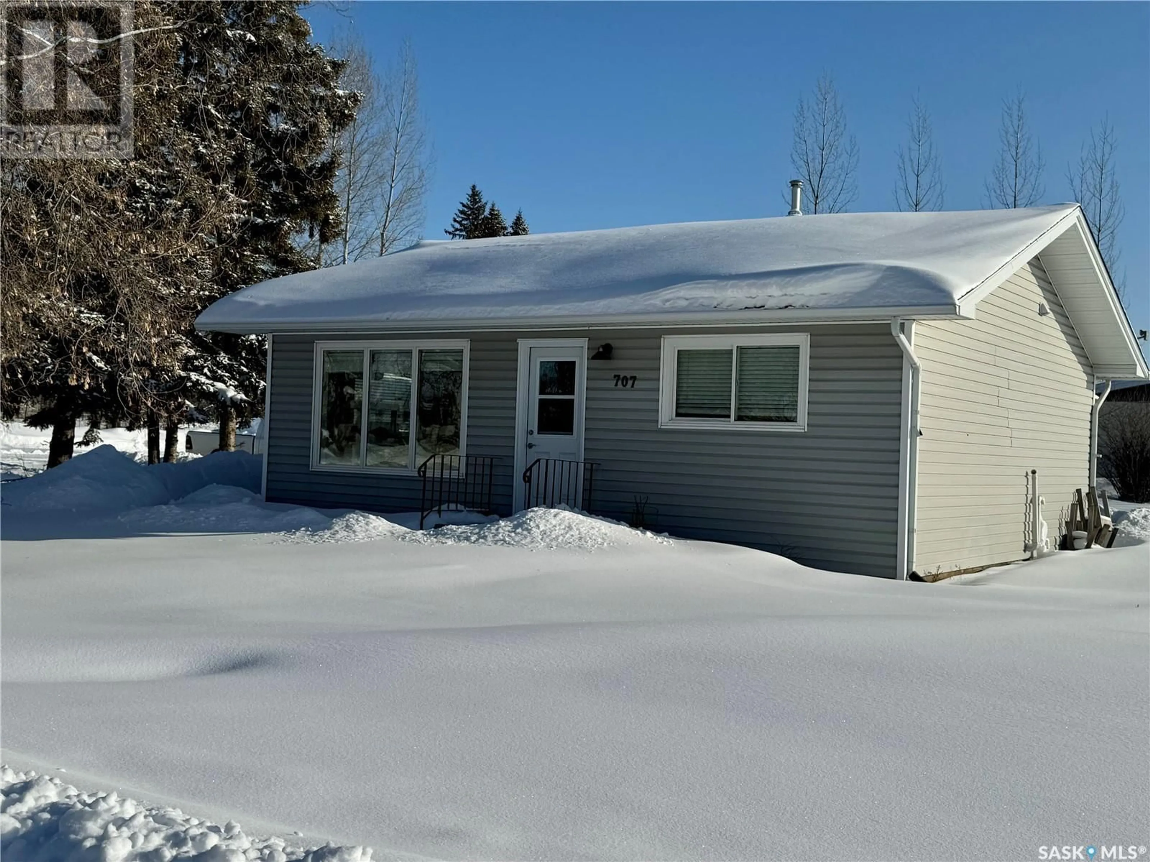 Home with vinyl exterior material, street for 707 1st AVENUE NE, Preeceville Saskatchewan S0A3B0