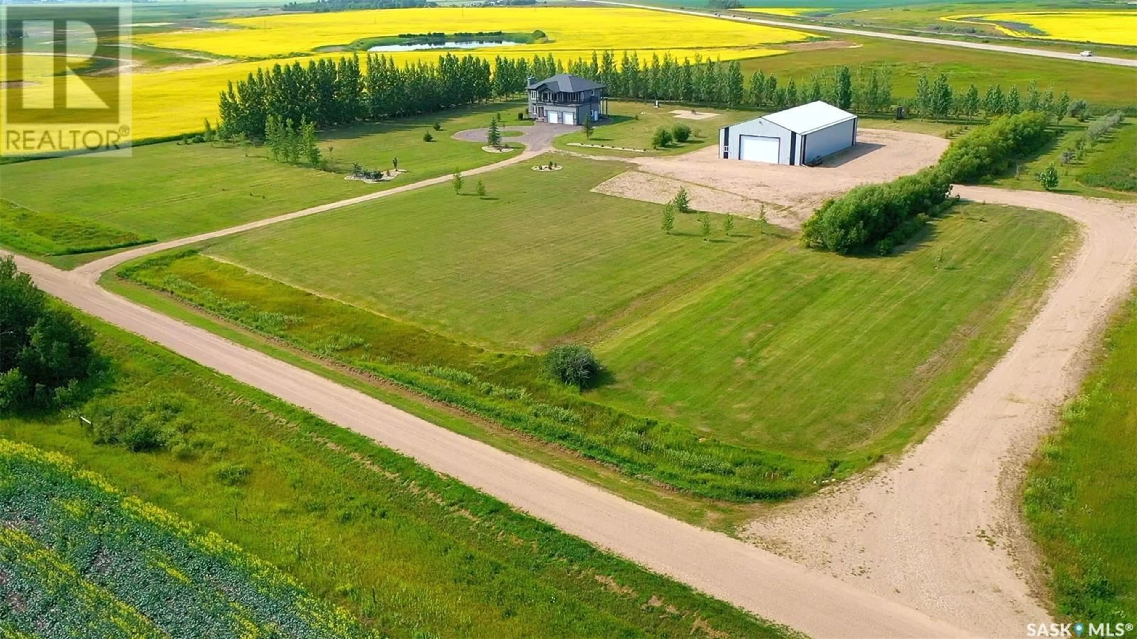 A pic from outside/outdoor area/front of a property/back of a property/a pic from drone, building for BARBOUR ACREAGE, Wallace Rm No. 243 Saskatchewan S3N3N0