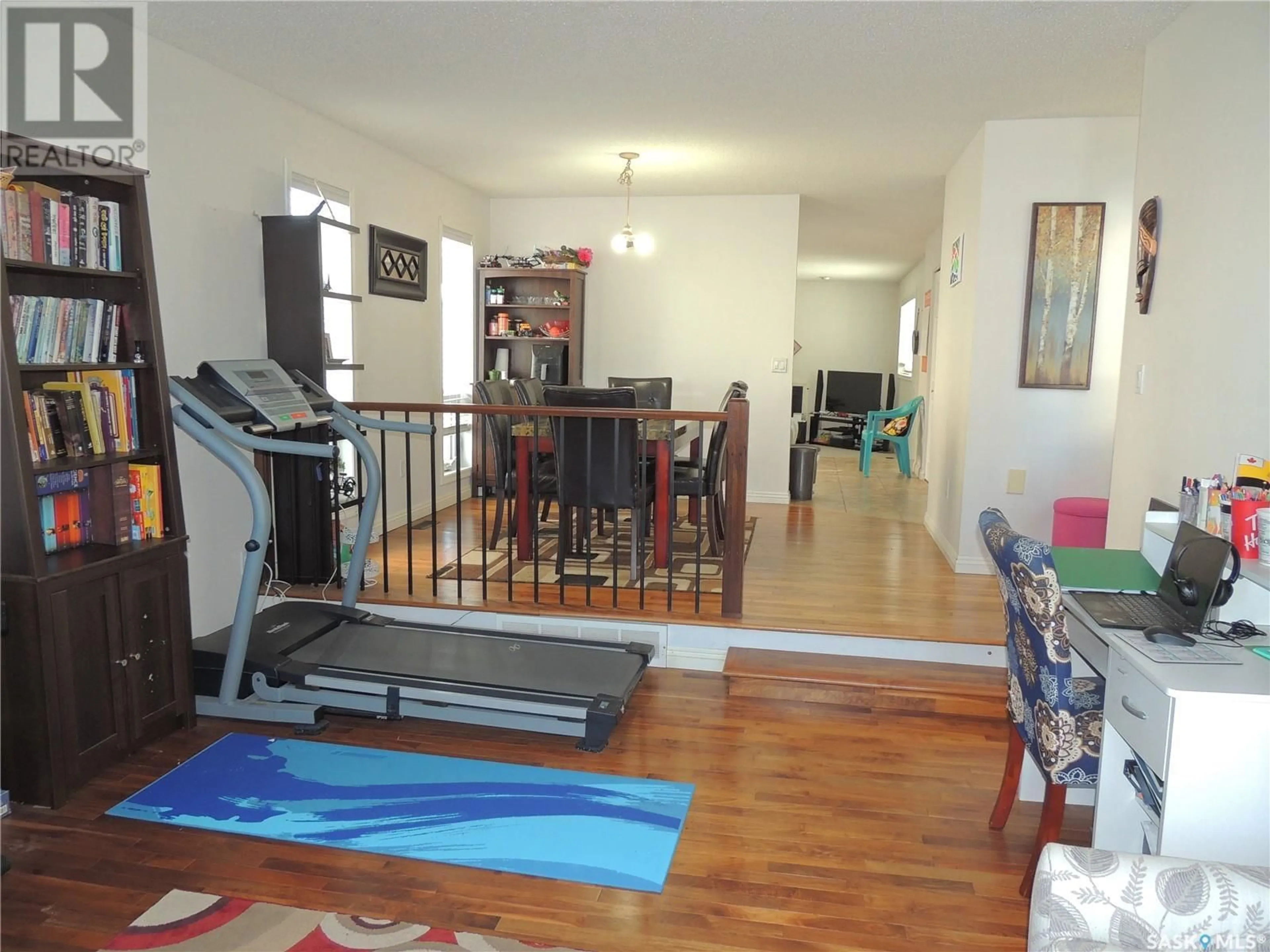 Dining room, wood/laminate floor for 421 MAPLE BAY, Estevan Saskatchewan S4A2E6