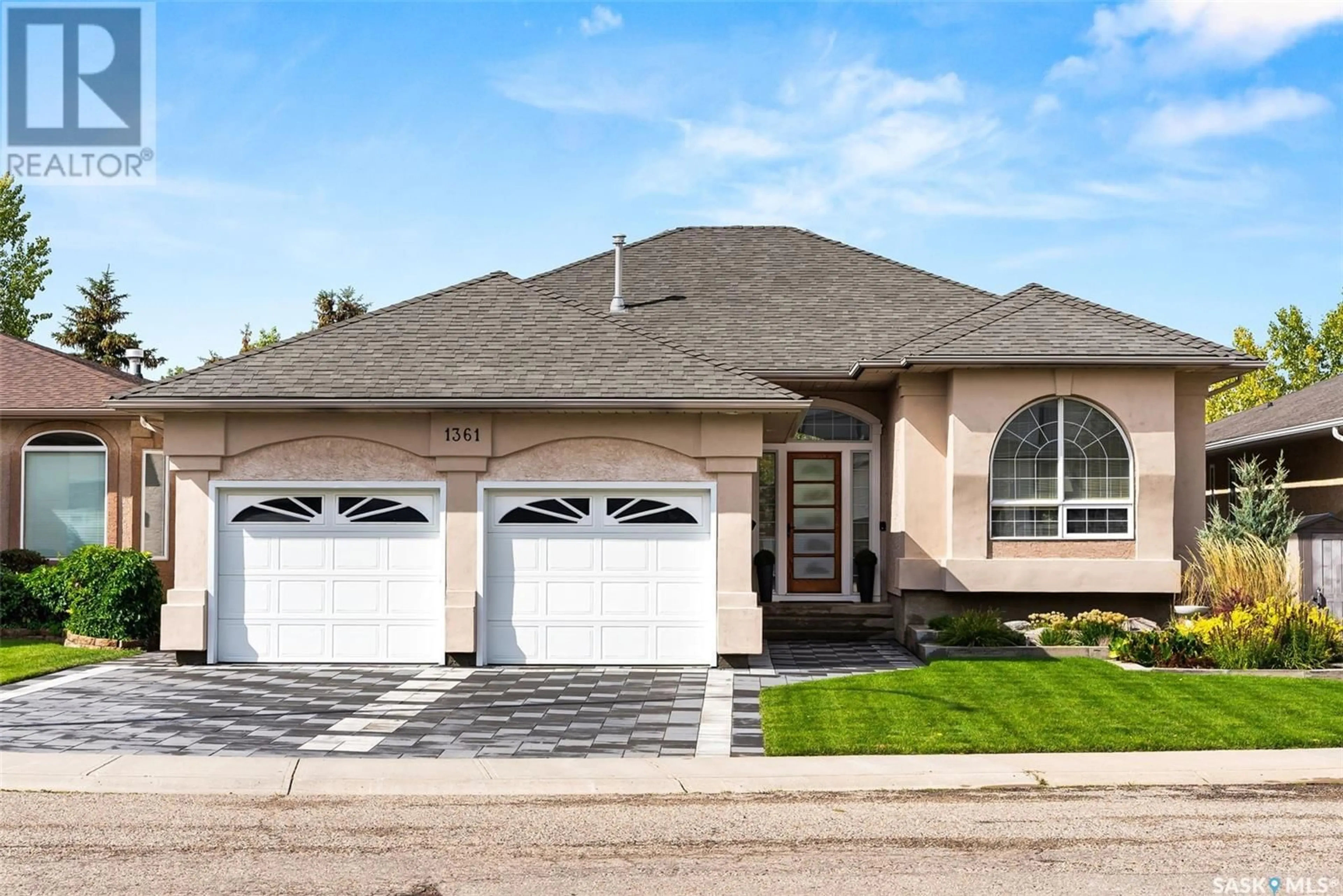 Home with brick exterior material, street for 1361 Lapchuk CRESCENT N, Regina Saskatchewan S4X4L4