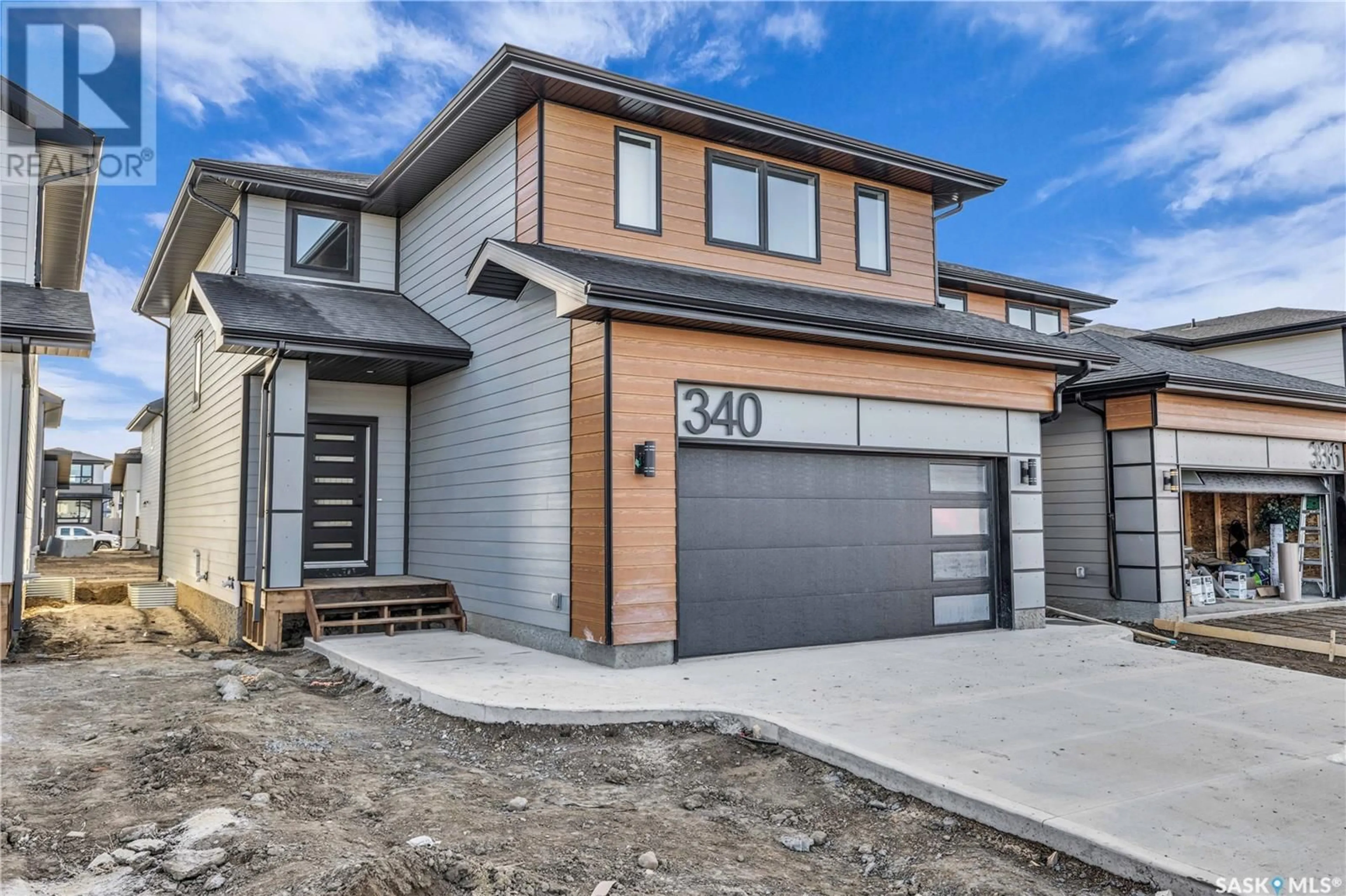 Home with brick exterior material, street for 143 LESKIW LANE, Saskatoon Saskatchewan S7V1R5