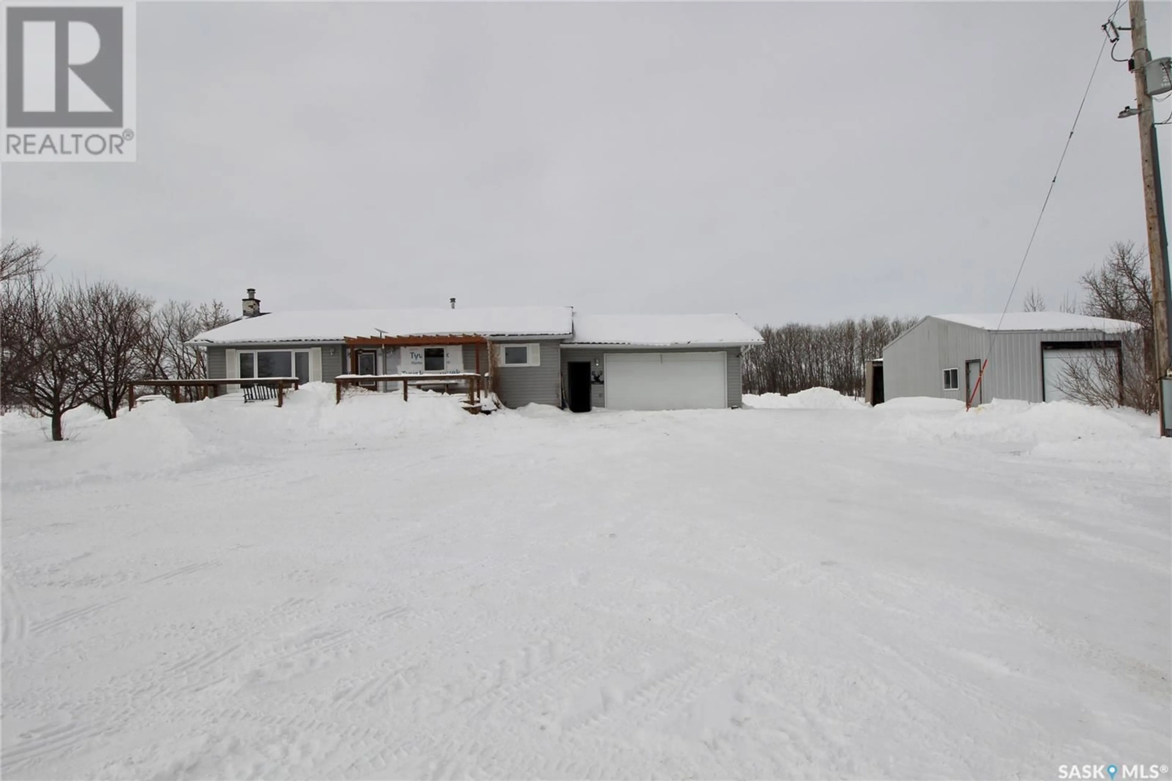 A pic from outside/outdoor area/front of a property/back of a property/a pic from drone, street for McLaughlin Acreage, Moosomin Rm No. 121 Saskatchewan S0G3N0