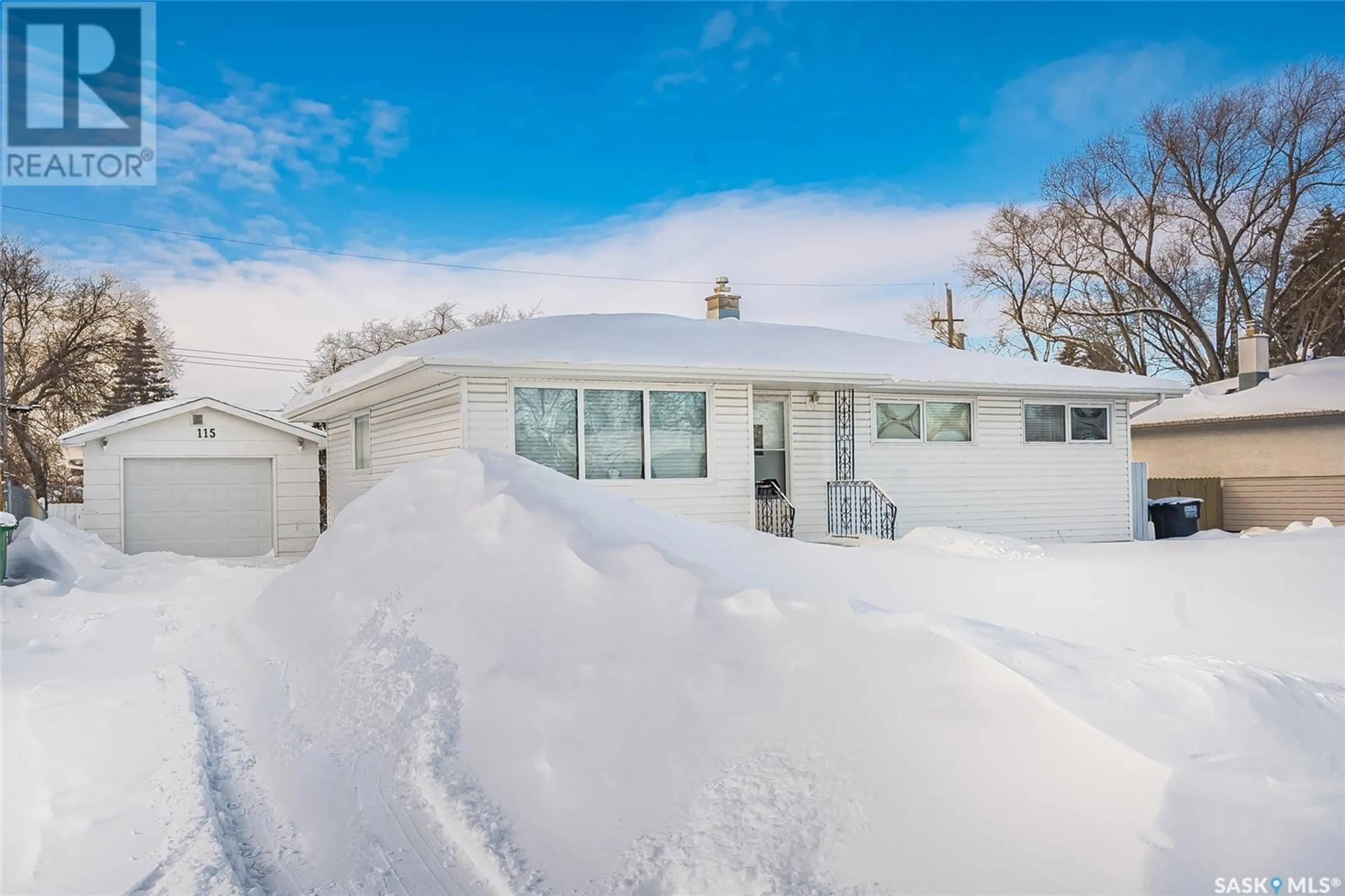 Home with vinyl exterior material, street for 115 O'Neil CRESCENT, Saskatoon Saskatchewan S7N1W9