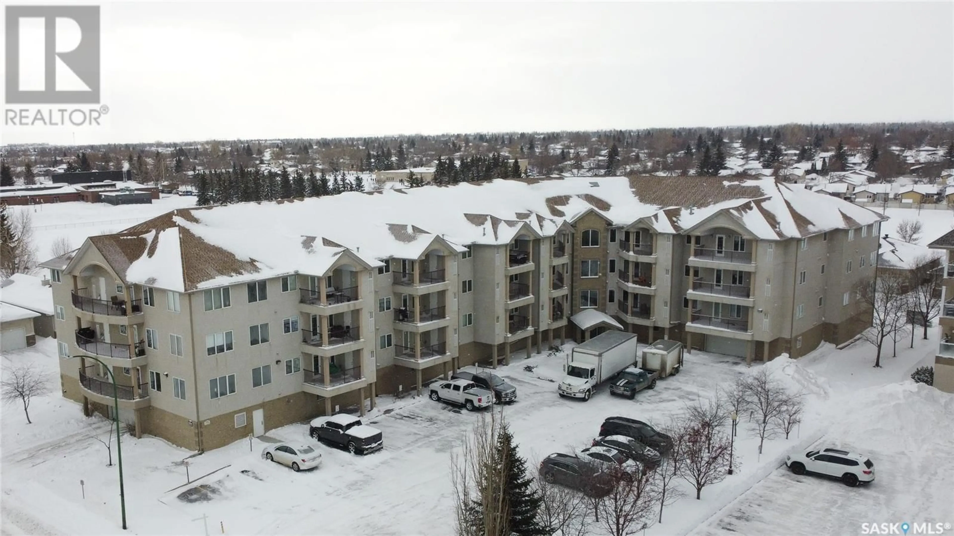 A pic from outside/outdoor area/front of a property/back of a property/a pic from drone, city buildings view from balcony for 408 2909 Arens ROAD E, Regina Saskatchewan S4V3A8