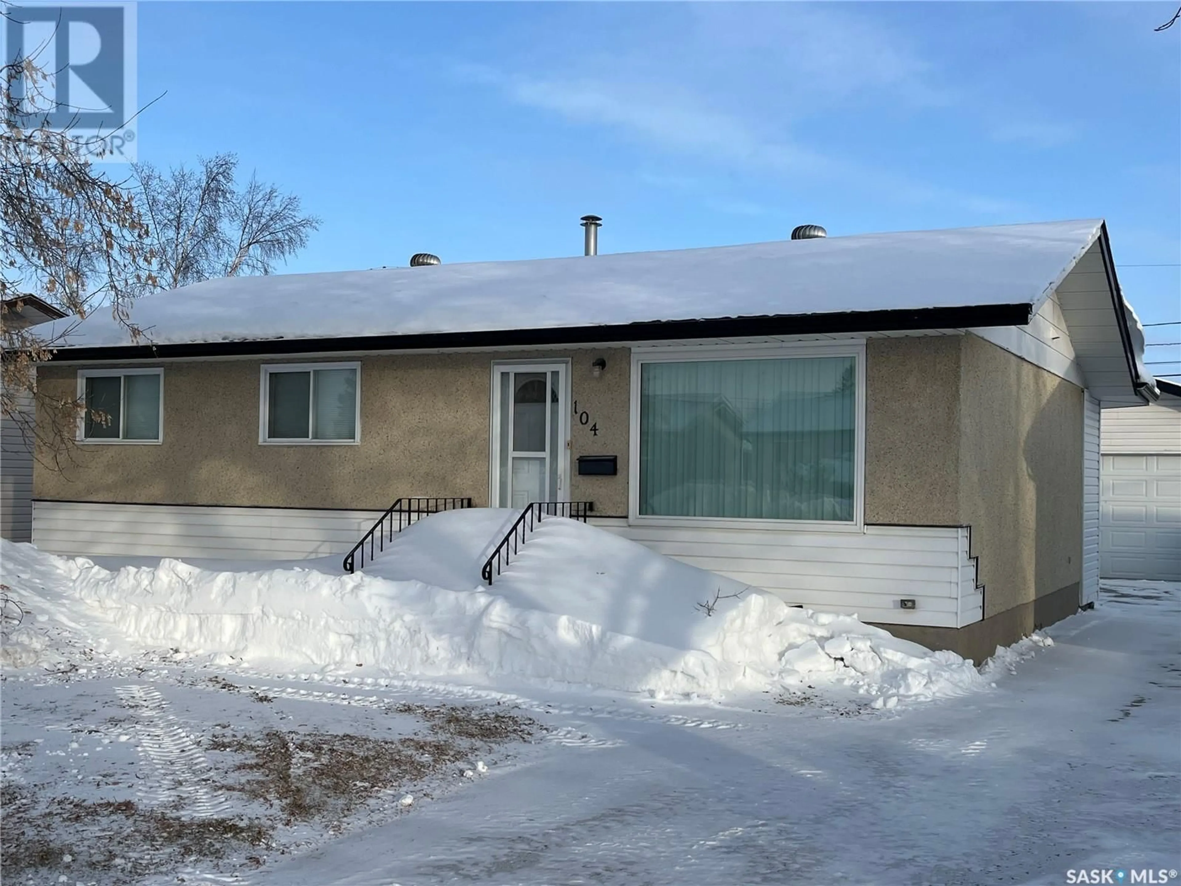 Home with vinyl exterior material, street for 104 Osborne STREET, Melfort Saskatchewan S0E1A0