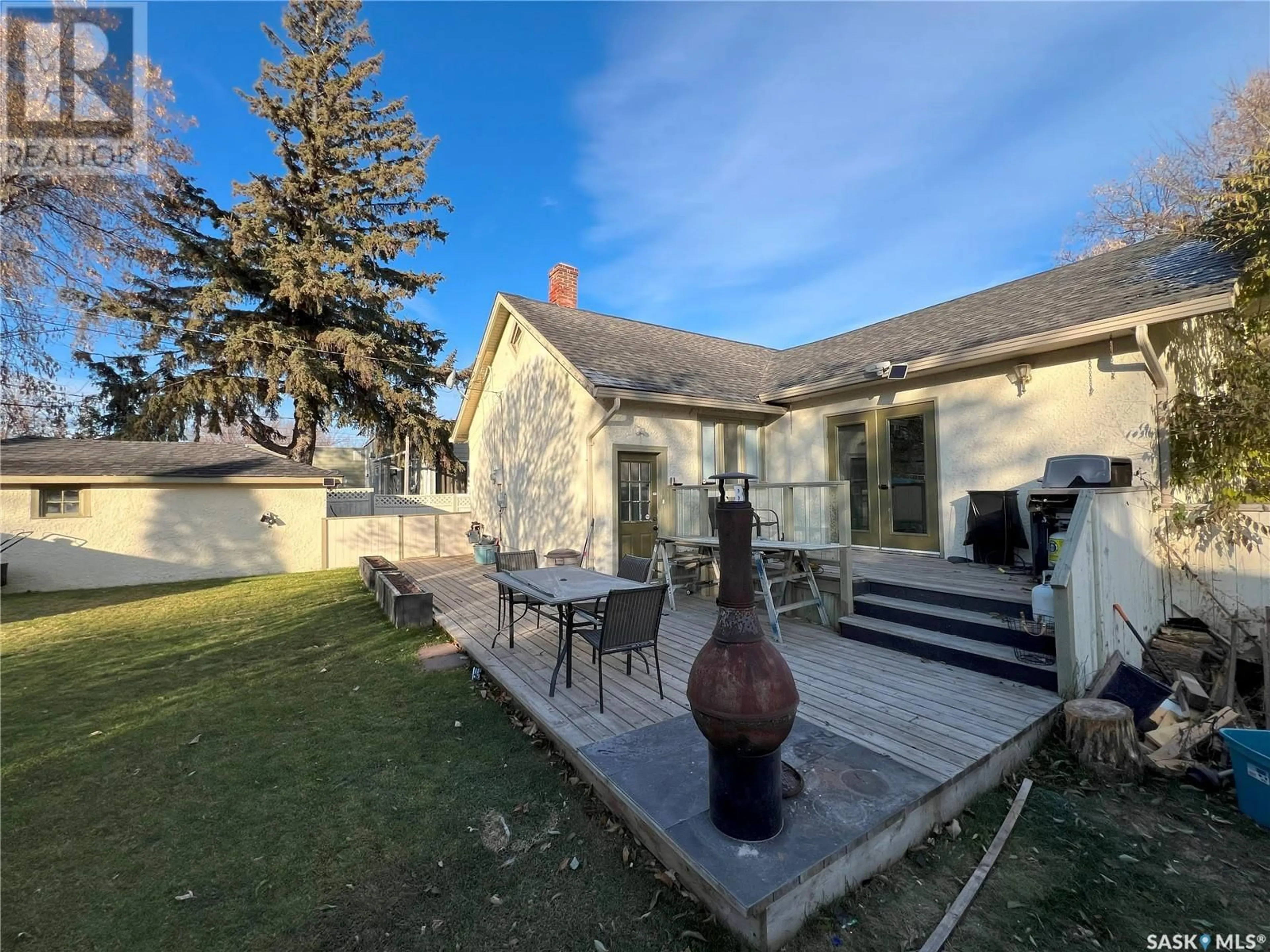 A pic from outside/outdoor area/front of a property/back of a property/a pic from drone, street for 49 21st STREET E, Prince Albert Saskatchewan S6V1L7