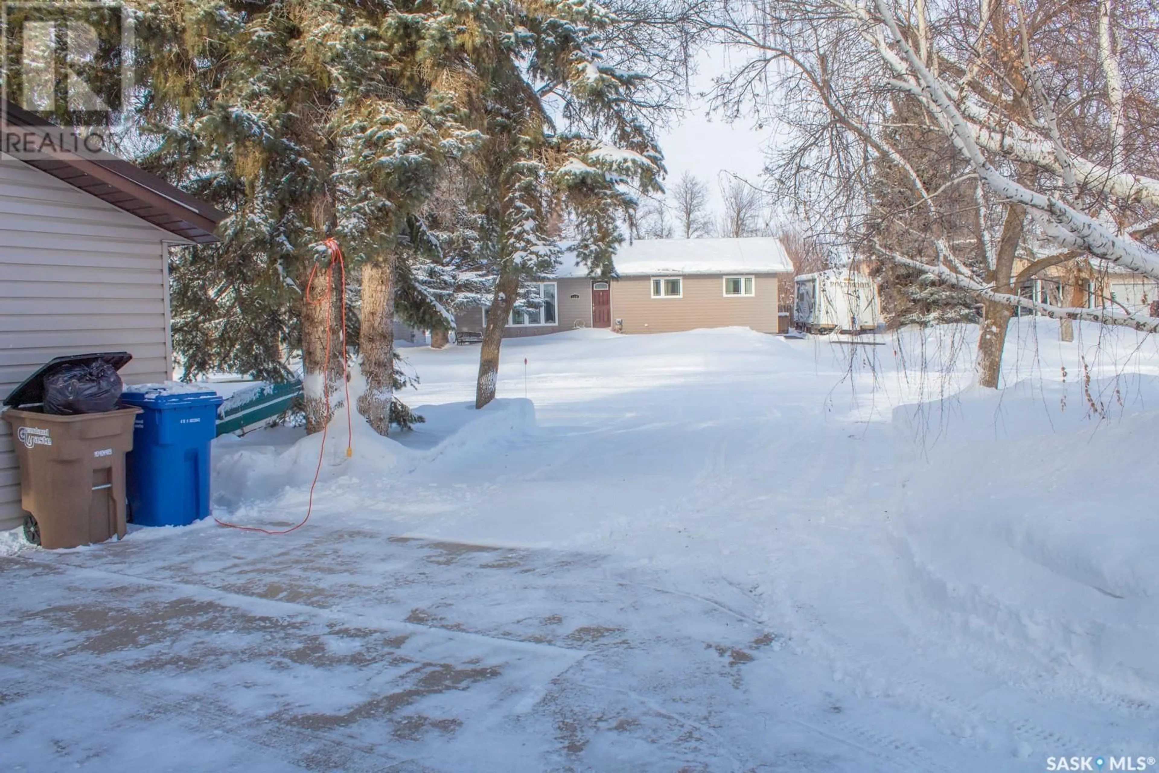 A pic from outside/outdoor area/front of a property/back of a property/a pic from drone, street for 123 Kennedy DRIVE, Melfort Saskatchewan S0E1A0