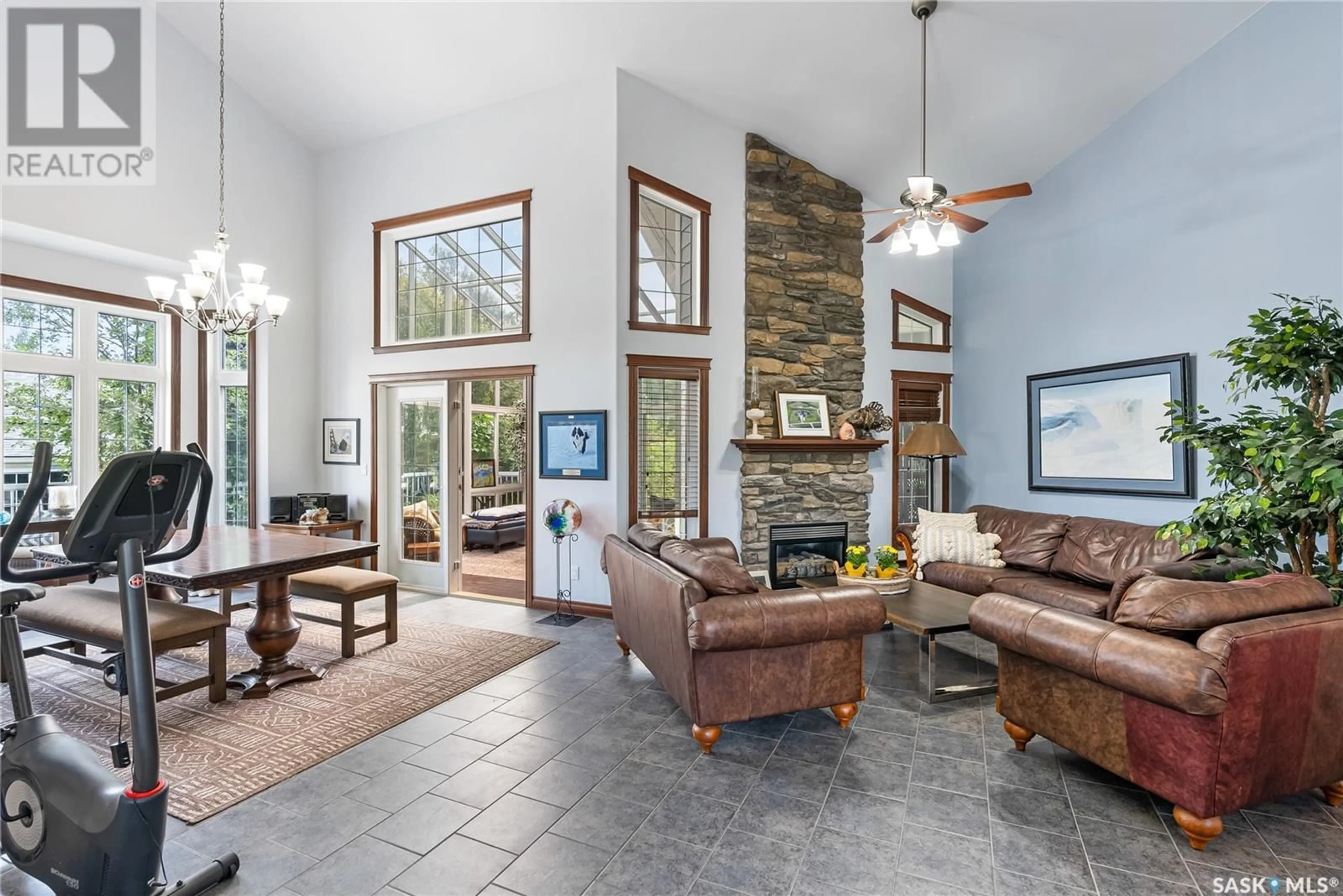 Living room with furniture, ceramic/tile floor for 117 PRAIRIE LANE, Aberdeen Rm No. 373 Saskatchewan S7A0A6